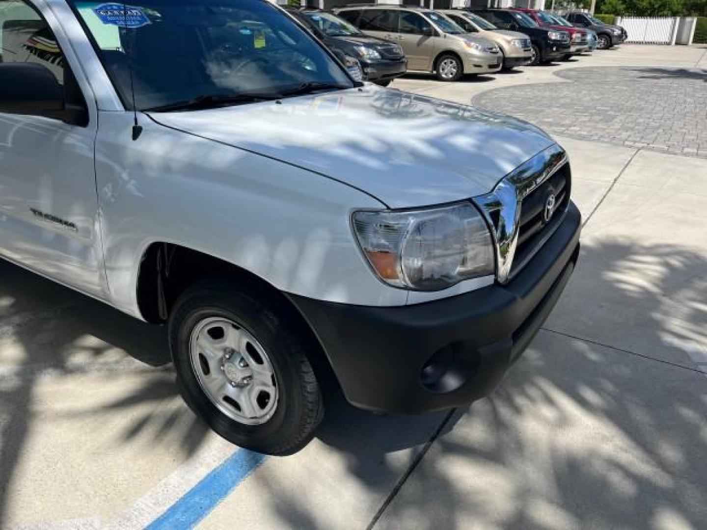 2007 Super White /Gray Toyota Tacoma AUTO AC LOW MILES 48,770 (5TENX22N27Z) with an 2.7L DOHC EFI 16-Valve I4 VVT-i Engine engine, Automatic transmission, located at 4701 North Dixie Hwy, Pompano Beach, FL, 33064, (954) 422-2889, 26.240938, -80.123474 - OUR WEBPAGE FLORIDACARS1.COM HAS OVER 100 PHOTOS AND FREE CARFAX LINK 2007 TOYOTA TACOMA ROAD READY WORK READY VIN: 5TENX22N27Z342629 NO RECALLS 2.7L I4 PICKUP LOW MILES 48,770 2.7L I4 F DOHC 16V 6,1 FT BED LENGTH GASOLINE 6 SERVICE RECORDS REAR WHEEL DRIVE 28 MPG 6.1' Bed Length Braking Assist Elec - Photo#74