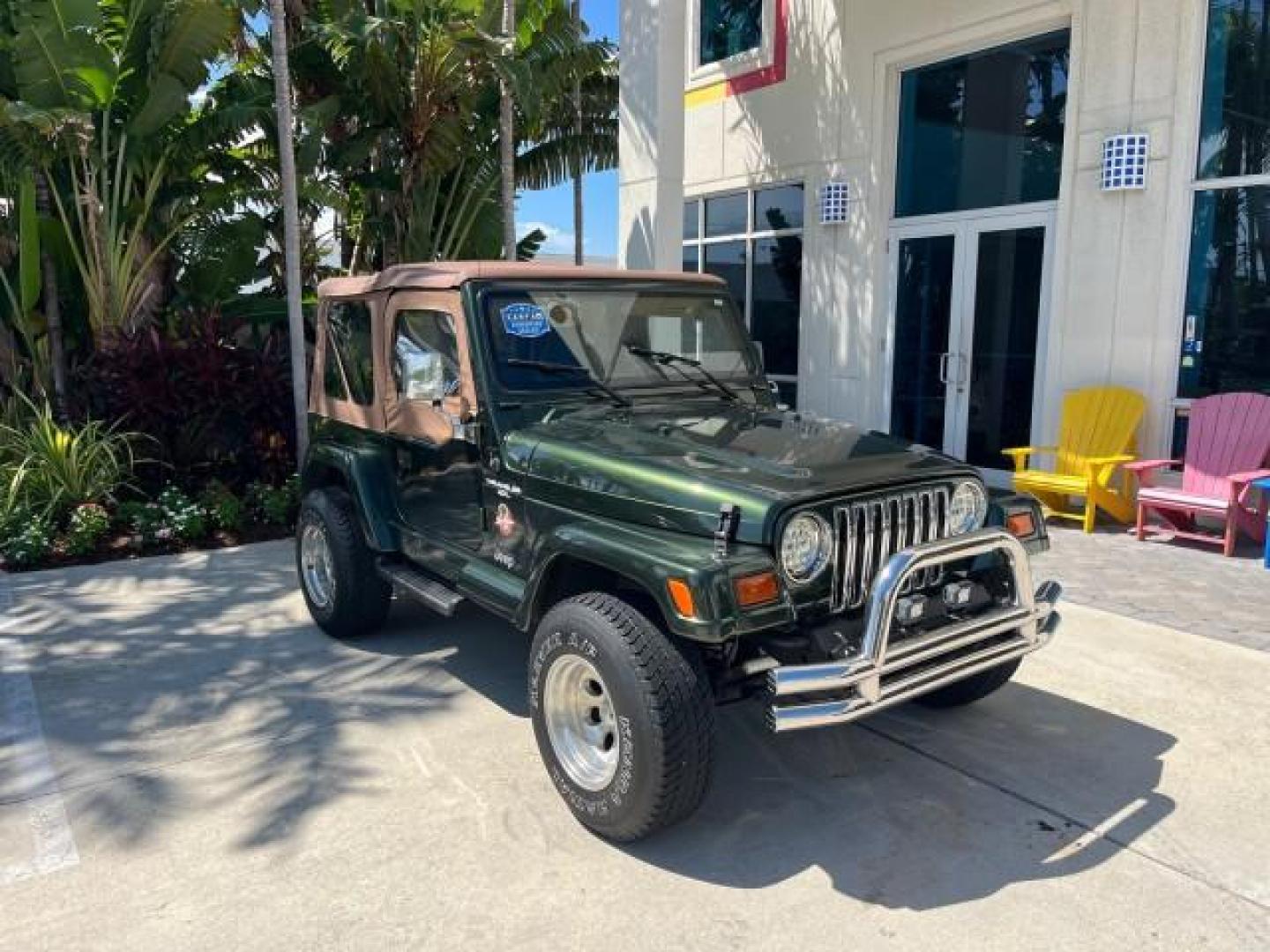 1998 Moss Green (PC) /Saddle Jeep Wrangler Sahara AUTO AC LOW MILES 60,233 (1J4FY49S2WP) with an 4.0L SMPI I6 Power Tech Engine engine, Automatic transmission, located at 4701 North Dixie Hwy, Pompano Beach, FL, 33064, (954) 422-2889, 26.240938, -80.123474 - OUR WEBPAGE FLORIDACARS1.COM HAS OVER 100 PHOTOS AND FREE CARFAX LINK 1998 JEEP WRANGLER SAHARA ROAD READY 4.0L I6 VIN: 1J4FY49S2WP723583 NO RECALLS 4X4 UTILITY (BLAZER, JIMMY, SCOUT, ETC.) LOW MILES 60,233 4.0L I6 F OHV FLORIDA OWNER GASOLINE CONVERTIBLE SOFT TOP REAR WHEEL DRIVE W/ 4X4 4X4 6 SERVI - Photo#1