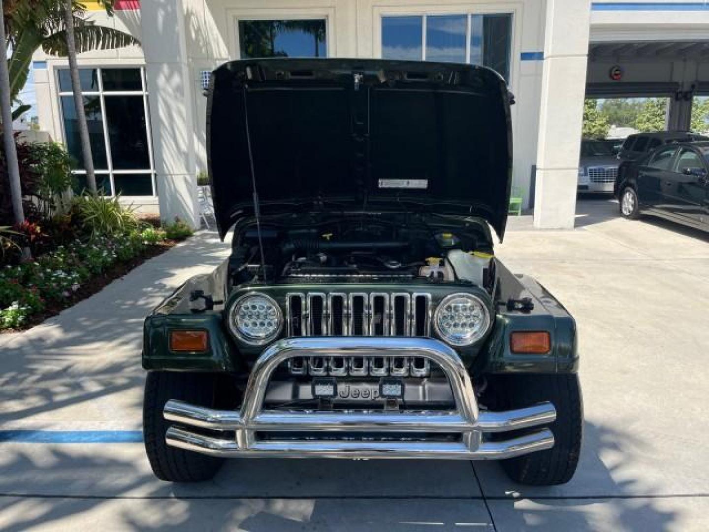 1998 Moss Green (PC) /Saddle Jeep Wrangler Sahara AUTO AC LOW MILES 60,233 (1J4FY49S2WP) with an 4.0L SMPI I6 Power Tech Engine engine, Automatic transmission, located at 4701 North Dixie Hwy, Pompano Beach, FL, 33064, (954) 422-2889, 26.240938, -80.123474 - OUR WEBPAGE FLORIDACARS1.COM HAS OVER 100 PHOTOS AND FREE CARFAX LINK 1998 JEEP WRANGLER SAHARA ROAD READY 4.0L I6 VIN: 1J4FY49S2WP723583 NO RECALLS 4X4 UTILITY (BLAZER, JIMMY, SCOUT, ETC.) LOW MILES 60,233 4.0L I6 F OHV FLORIDA OWNER GASOLINE CONVERTIBLE SOFT TOP REAR WHEEL DRIVE W/ 4X4 4X4 6 SERVI - Photo#51