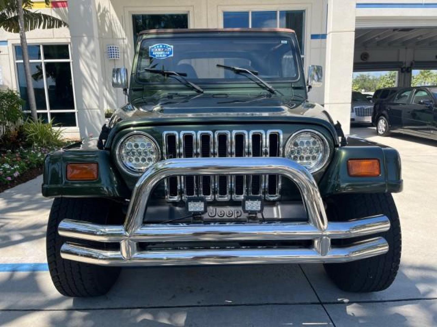 1998 Moss Green (PC) /Saddle Jeep Wrangler Sahara AUTO AC LOW MILES 60,233 (1J4FY49S2WP) with an 4.0L SMPI I6 Power Tech Engine engine, Automatic transmission, located at 4701 North Dixie Hwy, Pompano Beach, FL, 33064, (954) 422-2889, 26.240938, -80.123474 - OUR WEBPAGE FLORIDACARS1.COM HAS OVER 100 PHOTOS AND FREE CARFAX LINK 1998 JEEP WRANGLER SAHARA ROAD READY 4.0L I6 VIN: 1J4FY49S2WP723583 NO RECALLS 4X4 UTILITY (BLAZER, JIMMY, SCOUT, ETC.) LOW MILES 60,233 4.0L I6 F OHV FLORIDA OWNER GASOLINE CONVERTIBLE SOFT TOP REAR WHEEL DRIVE W/ 4X4 4X4 6 SERVI - Photo#55