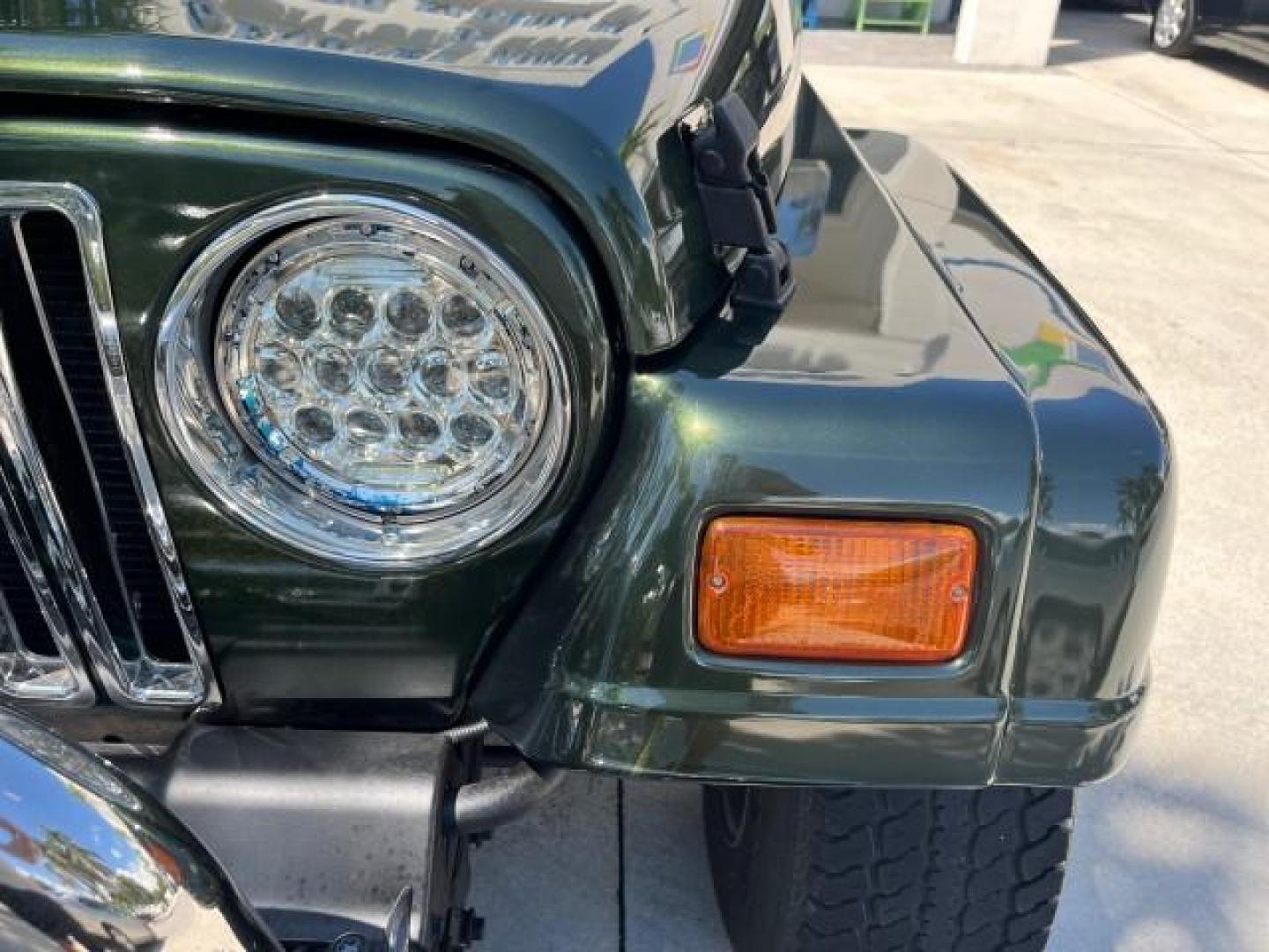 1998 Moss Green (PC) /Saddle Jeep Wrangler Sahara AUTO AC LOW MILES 60,233 (1J4FY49S2WP) with an 4.0L SMPI I6 Power Tech Engine engine, Automatic transmission, located at 4701 North Dixie Hwy, Pompano Beach, FL, 33064, (954) 422-2889, 26.240938, -80.123474 - OUR WEBPAGE FLORIDACARS1.COM HAS OVER 100 PHOTOS AND FREE CARFAX LINK 1998 JEEP WRANGLER SAHARA ROAD READY 4.0L I6 VIN: 1J4FY49S2WP723583 NO RECALLS 4X4 UTILITY (BLAZER, JIMMY, SCOUT, ETC.) LOW MILES 60,233 4.0L I6 F OHV FLORIDA OWNER GASOLINE CONVERTIBLE SOFT TOP REAR WHEEL DRIVE W/ 4X4 4X4 6 SERVI - Photo#58