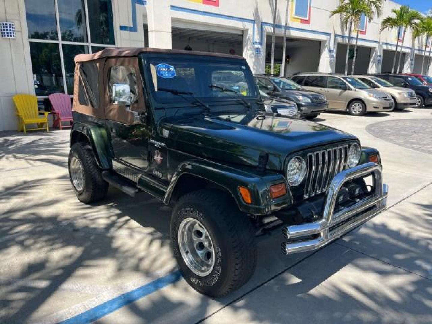 1998 Moss Green (PC) /Saddle Jeep Wrangler Sahara AUTO AC LOW MILES 60,233 (1J4FY49S2WP) with an 4.0L SMPI I6 Power Tech Engine engine, Automatic transmission, located at 4701 North Dixie Hwy, Pompano Beach, FL, 33064, (954) 422-2889, 26.240938, -80.123474 - OUR WEBPAGE FLORIDACARS1.COM HAS OVER 100 PHOTOS AND FREE CARFAX LINK 1998 JEEP WRANGLER SAHARA ROAD READY 4.0L I6 VIN: 1J4FY49S2WP723583 NO RECALLS 4X4 UTILITY (BLAZER, JIMMY, SCOUT, ETC.) LOW MILES 60,233 4.0L I6 F OHV FLORIDA OWNER GASOLINE CONVERTIBLE SOFT TOP REAR WHEEL DRIVE W/ 4X4 4X4 6 SERVI - Photo#63