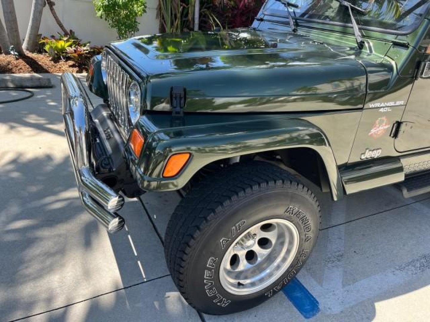 1998 Moss Green (PC) /Saddle Jeep Wrangler Sahara AUTO AC LOW MILES 60,233 (1J4FY49S2WP) with an 4.0L SMPI I6 Power Tech Engine engine, Automatic transmission, located at 4701 North Dixie Hwy, Pompano Beach, FL, 33064, (954) 422-2889, 26.240938, -80.123474 - OUR WEBPAGE FLORIDACARS1.COM HAS OVER 100 PHOTOS AND FREE CARFAX LINK 1998 JEEP WRANGLER SAHARA ROAD READY 4.0L I6 VIN: 1J4FY49S2WP723583 NO RECALLS 4X4 UTILITY (BLAZER, JIMMY, SCOUT, ETC.) LOW MILES 60,233 4.0L I6 F OHV FLORIDA OWNER GASOLINE CONVERTIBLE SOFT TOP REAR WHEEL DRIVE W/ 4X4 4X4 6 SERVI - Photo#73