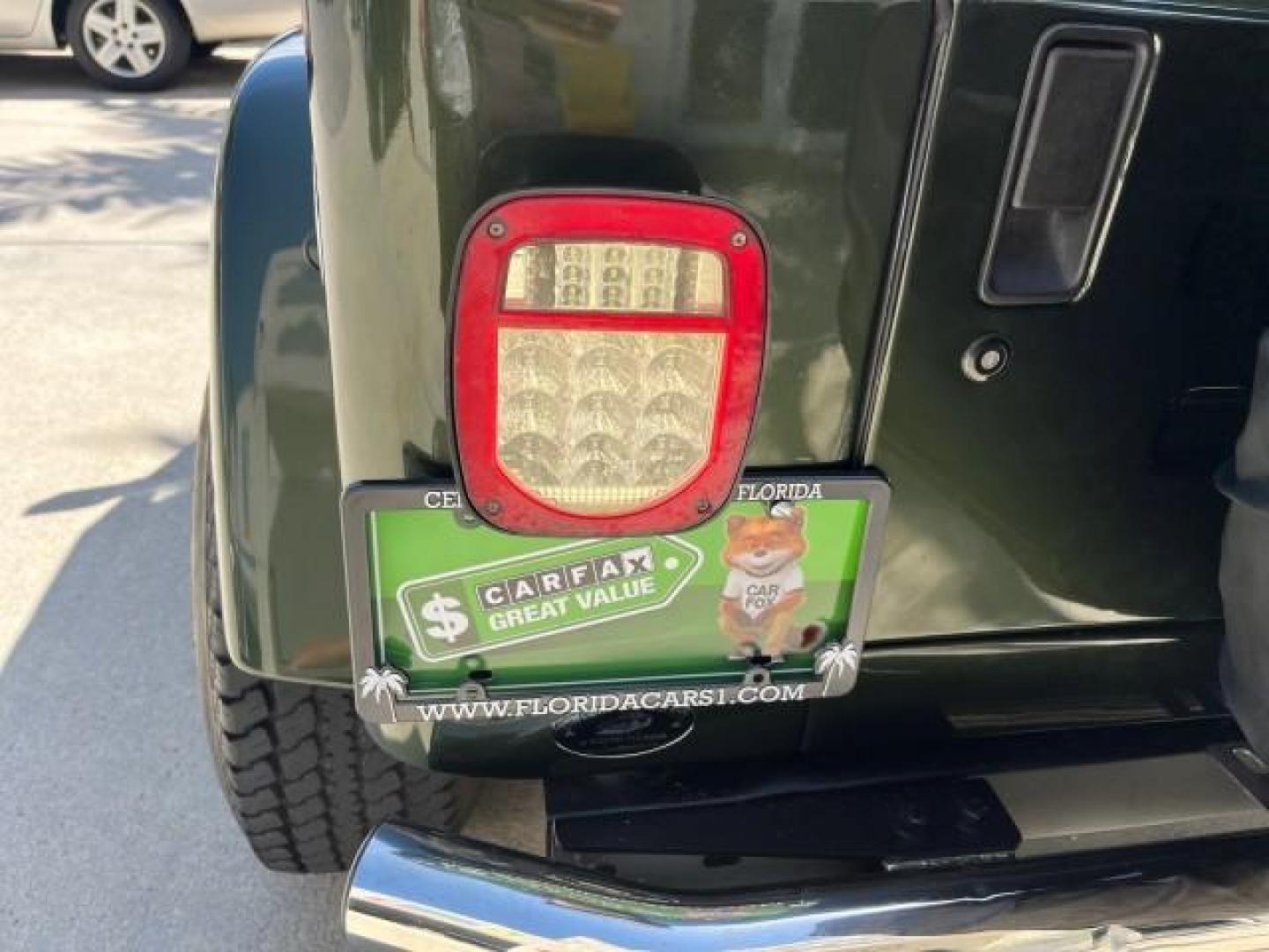 1998 Moss Green (PC) /Saddle Jeep Wrangler Sahara AUTO AC LOW MILES 60,233 (1J4FY49S2WP) with an 4.0L SMPI I6 Power Tech Engine engine, Automatic transmission, located at 4701 North Dixie Hwy, Pompano Beach, FL, 33064, (954) 422-2889, 26.240938, -80.123474 - OUR WEBPAGE FLORIDACARS1.COM HAS OVER 100 PHOTOS AND FREE CARFAX LINK 1998 JEEP WRANGLER SAHARA ROAD READY 4.0L I6 VIN: 1J4FY49S2WP723583 NO RECALLS 4X4 UTILITY (BLAZER, JIMMY, SCOUT, ETC.) LOW MILES 60,233 4.0L I6 F OHV FLORIDA OWNER GASOLINE CONVERTIBLE SOFT TOP REAR WHEEL DRIVE W/ 4X4 4X4 6 SERVI - Photo#88