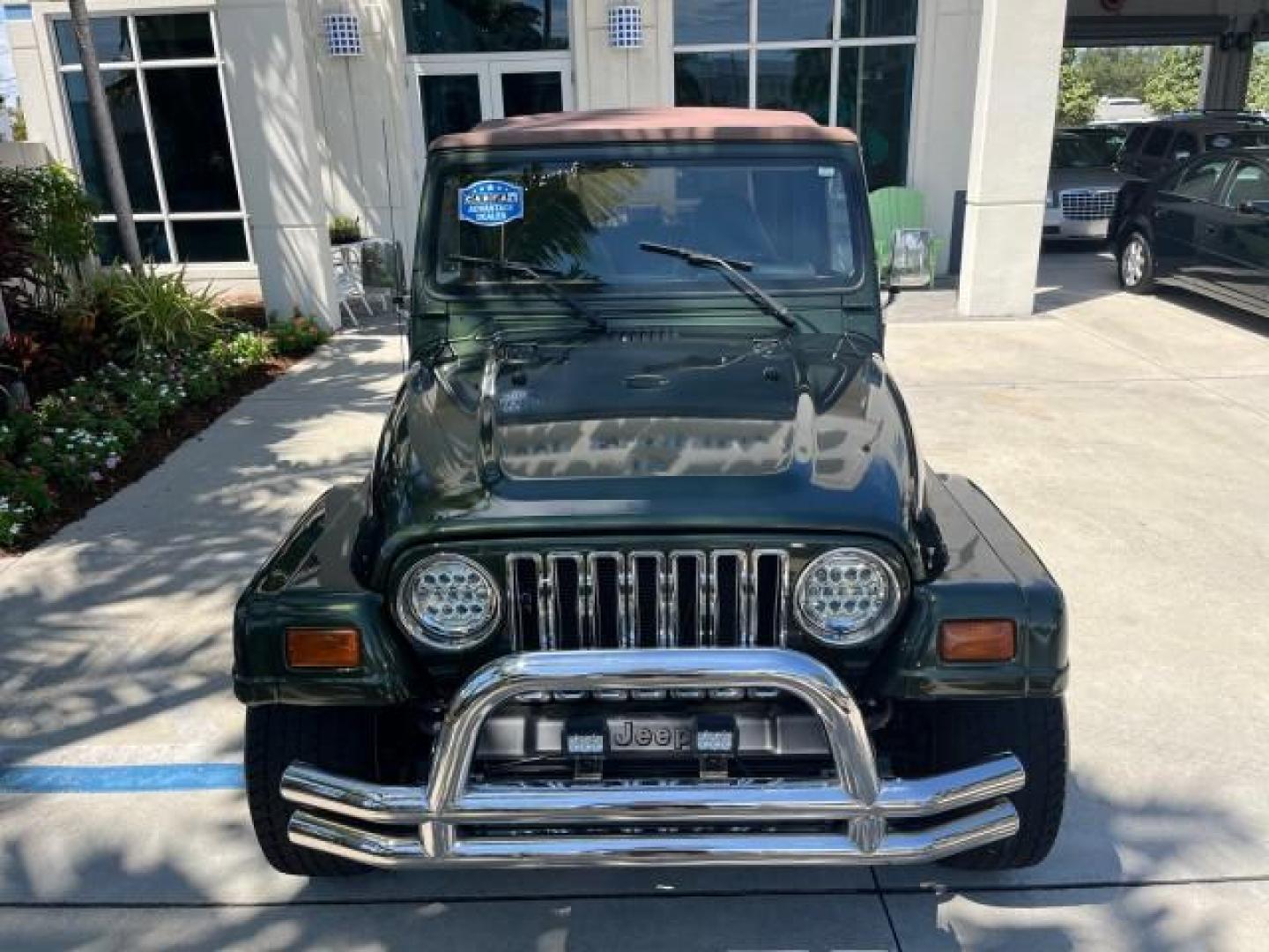 1998 Moss Green (PC) /Saddle Jeep Wrangler Sahara AUTO AC LOW MILES 60,233 (1J4FY49S2WP) with an 4.0L SMPI I6 Power Tech Engine engine, Automatic transmission, located at 4701 North Dixie Hwy, Pompano Beach, FL, 33064, (954) 422-2889, 26.240938, -80.123474 - OUR WEBPAGE FLORIDACARS1.COM HAS OVER 100 PHOTOS AND FREE CARFAX LINK 1998 JEEP WRANGLER SAHARA ROAD READY 4.0L I6 VIN: 1J4FY49S2WP723583 NO RECALLS 4X4 UTILITY (BLAZER, JIMMY, SCOUT, ETC.) LOW MILES 60,233 4.0L I6 F OHV FLORIDA OWNER GASOLINE CONVERTIBLE SOFT TOP REAR WHEEL DRIVE W/ 4X4 4X4 6 SERVI - Photo#98