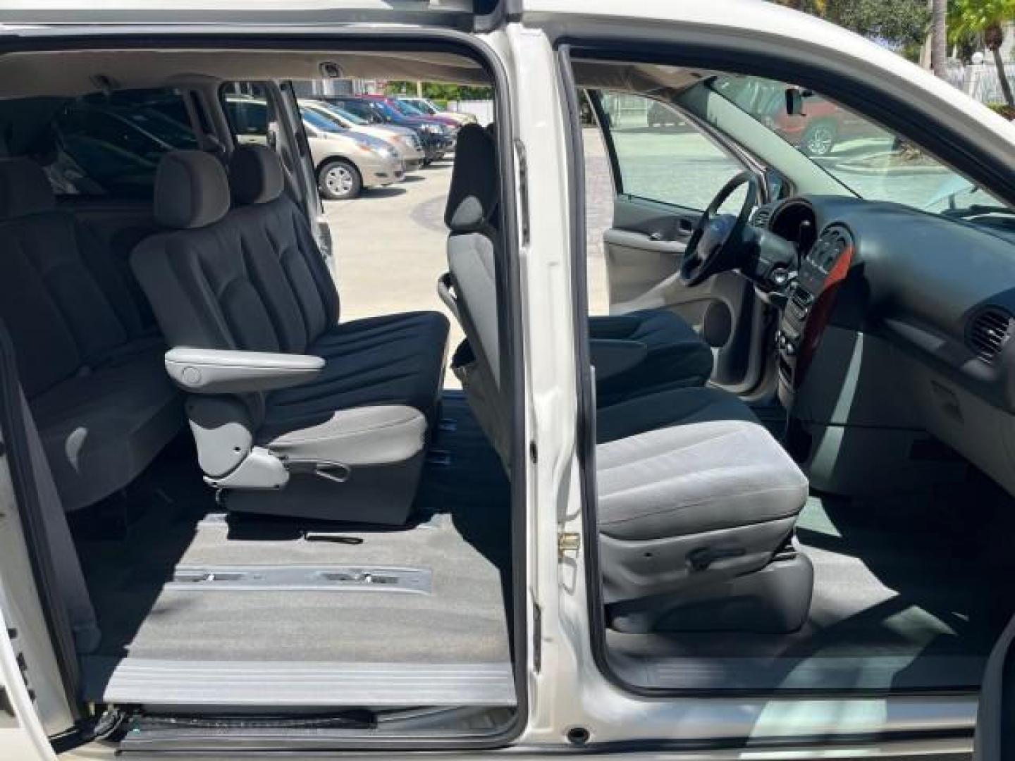 2005 Stone White /Med Slate Gray Chrysler Town and Country LOW MILES 54,735 (1C4GP45R85B) with an 3.3L OHV SMPI V6 Engine engine, Automatic transmission, located at 4701 North Dixie Hwy, Pompano Beach, FL, 33064, (954) 422-2889, 26.240938, -80.123474 - OUR WEBPAGE FLORIDACARS1.COM HAS OVER 100 PHOTOS AND FREE CARFAX LINK 2005 CHRYSLER TOWN AND COUNTRY ROAD READY 3.3L V6 VIN: 1C4GP45R85B317450 NO ACCIDENTS VAN NO RECALLS 3.3L V6 F OHV 24V FLORIDA OWNER GASOLINE POWER SEATS/MIRRORS LOW MILES 54,735 FRONT WHEEL DRIVE 20 SERVICE RECORDS 3 ROW SEATS 26 - Photo#12