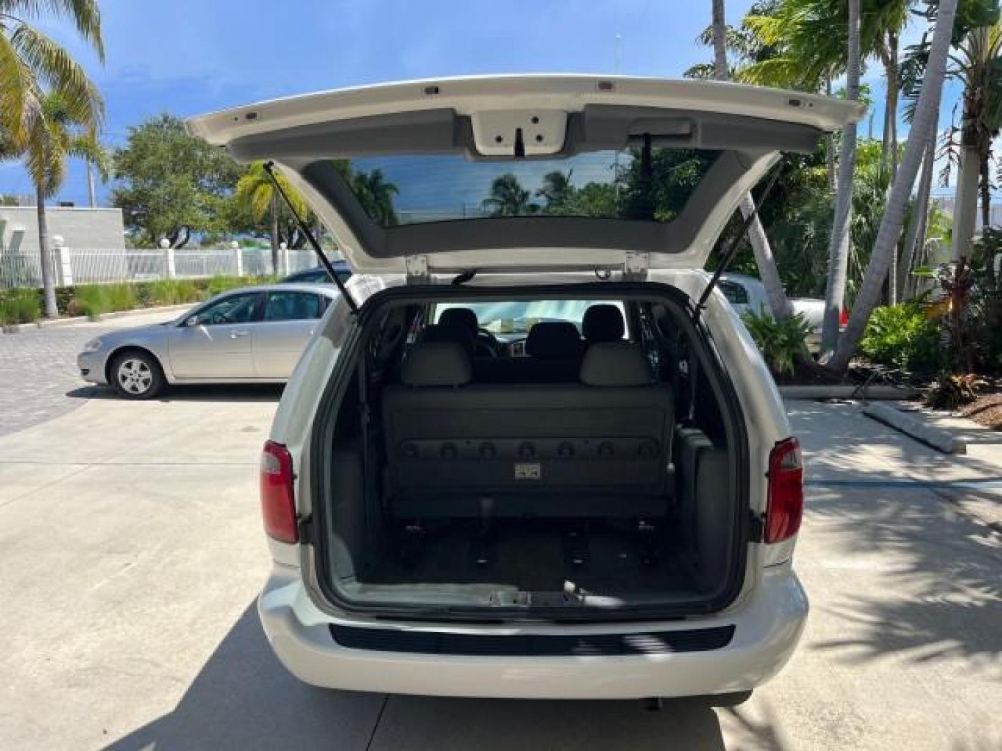 2005 Stone White /Med Slate Gray Chrysler Town and Country LOW MILES 54,735 (1C4GP45R85B) with an 3.3L OHV SMPI V6 Engine engine, Automatic transmission, located at 4701 North Dixie Hwy, Pompano Beach, FL, 33064, (954) 422-2889, 26.240938, -80.123474 - OUR WEBPAGE FLORIDACARS1.COM HAS OVER 100 PHOTOS AND FREE CARFAX LINK 2005 CHRYSLER TOWN AND COUNTRY ROAD READY 3.3L V6 VIN: 1C4GP45R85B317450 NO ACCIDENTS VAN NO RECALLS 3.3L V6 F OHV 24V FLORIDA OWNER GASOLINE POWER SEATS/MIRRORS LOW MILES 54,735 FRONT WHEEL DRIVE 20 SERVICE RECORDS 3 ROW SEATS 26 - Photo#65