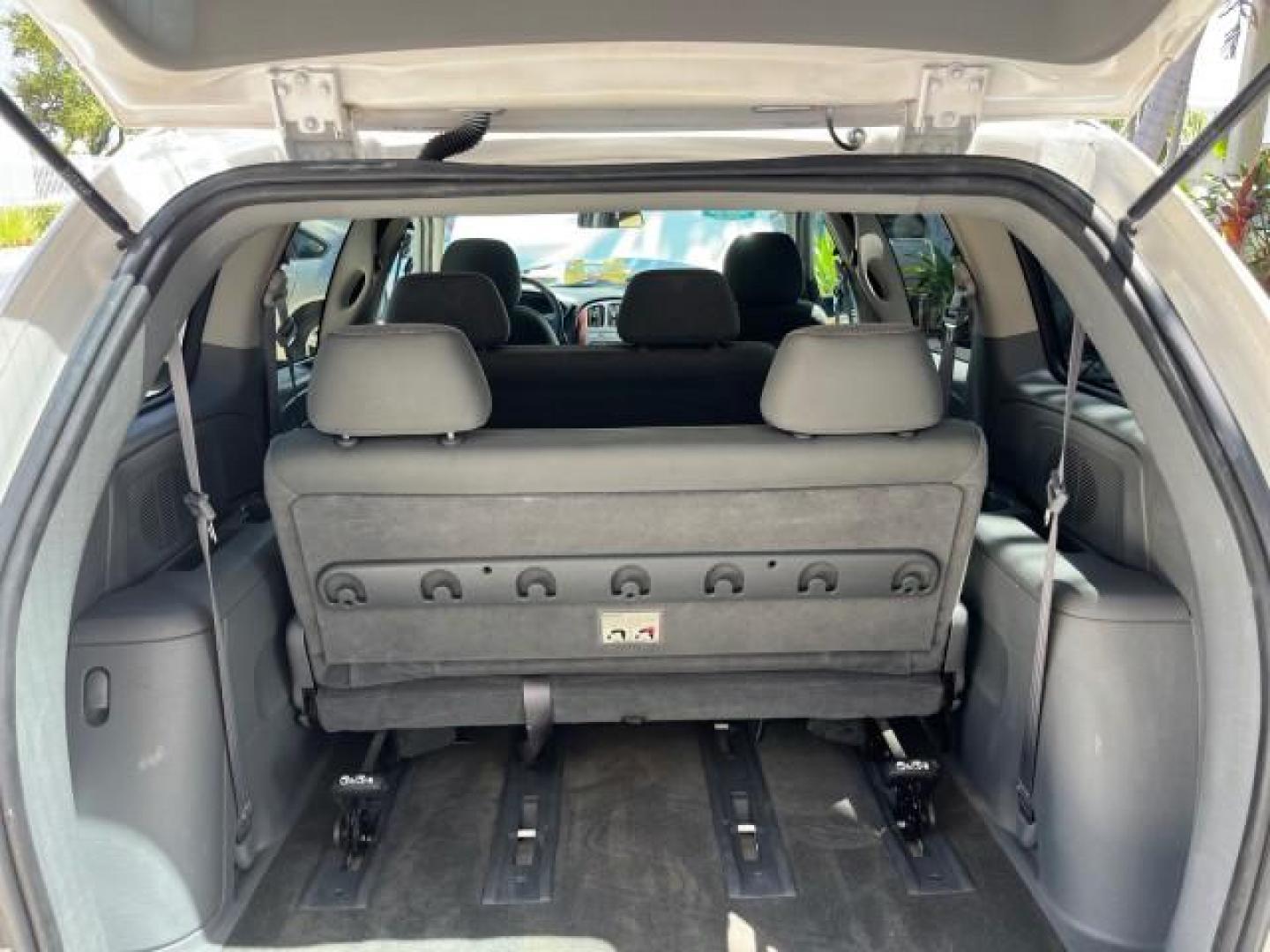 2005 Stone White /Med Slate Gray Chrysler Town and Country LOW MILES 54,735 (1C4GP45R85B) with an 3.3L OHV SMPI V6 Engine engine, Automatic transmission, located at 4701 North Dixie Hwy, Pompano Beach, FL, 33064, (954) 422-2889, 26.240938, -80.123474 - OUR WEBPAGE FLORIDACARS1.COM HAS OVER 100 PHOTOS AND FREE CARFAX LINK 2005 CHRYSLER TOWN AND COUNTRY ROAD READY 3.3L V6 VIN: 1C4GP45R85B317450 NO ACCIDENTS VAN NO RECALLS 3.3L V6 F OHV 24V FLORIDA OWNER GASOLINE POWER SEATS/MIRRORS LOW MILES 54,735 FRONT WHEEL DRIVE 20 SERVICE RECORDS 3 ROW SEATS 26 - Photo#66