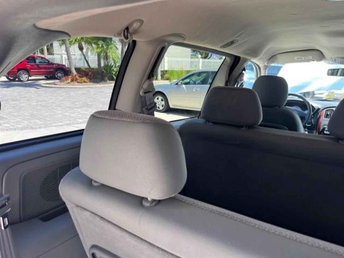 2005 Stone White /Med Slate Gray Chrysler Town and Country LOW MILES 54,735 (1C4GP45R85B) with an 3.3L OHV SMPI V6 Engine engine, Automatic transmission, located at 4701 North Dixie Hwy, Pompano Beach, FL, 33064, (954) 422-2889, 26.240938, -80.123474 - OUR WEBPAGE FLORIDACARS1.COM HAS OVER 100 PHOTOS AND FREE CARFAX LINK 2005 CHRYSLER TOWN AND COUNTRY ROAD READY 3.3L V6 VIN: 1C4GP45R85B317450 NO ACCIDENTS VAN NO RECALLS 3.3L V6 F OHV 24V FLORIDA OWNER GASOLINE POWER SEATS/MIRRORS LOW MILES 54,735 FRONT WHEEL DRIVE 20 SERVICE RECORDS 3 ROW SEATS 26 - Photo#69