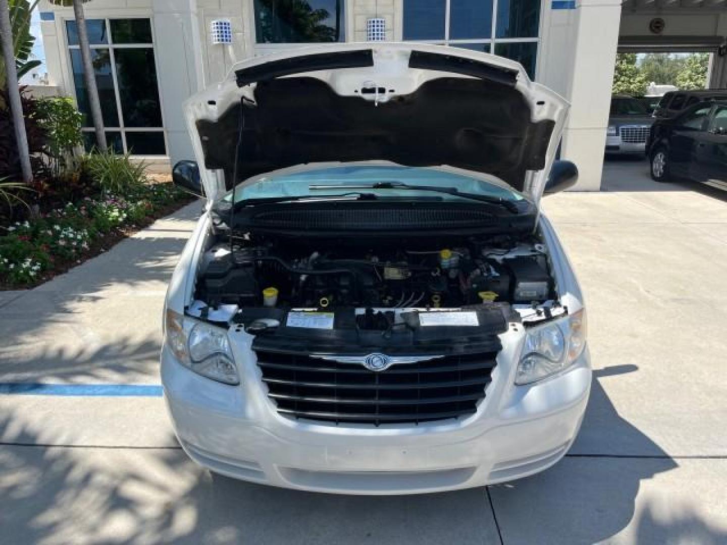 2005 Stone White /Med Slate Gray Chrysler Town and Country LOW MILES 54,735 (1C4GP45R85B) with an 3.3L OHV SMPI V6 Engine engine, Automatic transmission, located at 4701 North Dixie Hwy, Pompano Beach, FL, 33064, (954) 422-2889, 26.240938, -80.123474 - OUR WEBPAGE FLORIDACARS1.COM HAS OVER 100 PHOTOS AND FREE CARFAX LINK 2005 CHRYSLER TOWN AND COUNTRY ROAD READY 3.3L V6 VIN: 1C4GP45R85B317450 NO ACCIDENTS VAN NO RECALLS 3.3L V6 F OHV 24V FLORIDA OWNER GASOLINE POWER SEATS/MIRRORS LOW MILES 54,735 FRONT WHEEL DRIVE 20 SERVICE RECORDS 3 ROW SEATS 26 - Photo#70