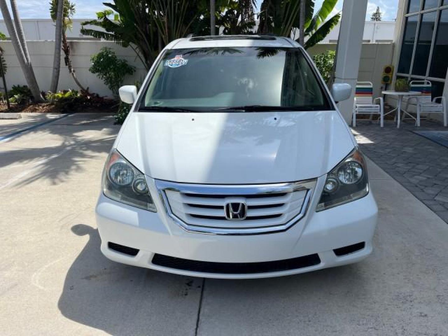 2010 Taffeta White /Ivory Honda Odyssey 1 FL EX-L LOW MILES 60,630 (5FNRL3H69AB) with an 3.5L SOHC MPFI 24-Valve i-VTEC V6 Engine engine, Automatic transmission, located at 4701 North Dixie Hwy, Pompano Beach, FL, 33064, (954) 422-2889, 26.240938, -80.123474 - OUR WEBPAGE FLORIDACARS1.COM HAS OVER 100 PHOTOS AND FREE CARFAX LINK 2010 HONDA ODYSSEY EX-L ROAD READY 3.5L V6 VIN: 5FNRL3H69AB062878 POWER LIFTGATE NO ACCIDENTS NO RECALLS VAN 1 OWNER FLORIDA 3 ROW LEATHER SEATS 3.5L V6 F SOHC 24V LOW MILES 60,630 POWER SUNROOF GASOLINE BACK UP CAMERA POWER SLIDI - Photo#2