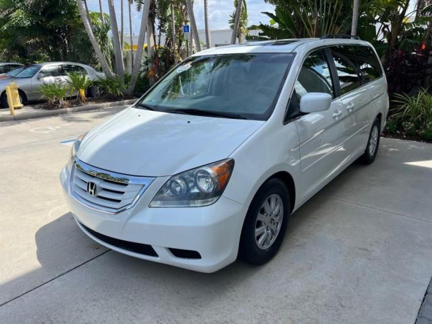 2010 Taffeta White /Ivory Honda Odyssey 1 FL EX-L LOW MILES 60,630 (5FNRL3H69AB) with an 3.5L SOHC MPFI 24-Valve i-VTEC V6 Engine engine, Automatic transmission, located at 4701 North Dixie Hwy, Pompano Beach, FL, 33064, (954) 422-2889, 26.240938, -80.123474 - OUR WEBPAGE FLORIDACARS1.COM HAS OVER 100 PHOTOS AND FREE CARFAX LINK 2010 HONDA ODYSSEY EX-L ROAD READY 3.5L V6 VIN: 5FNRL3H69AB062878 POWER LIFTGATE NO ACCIDENTS NO RECALLS VAN 1 OWNER FLORIDA 3 ROW LEATHER SEATS 3.5L V6 F SOHC 24V LOW MILES 60,630 POWER SUNROOF GASOLINE BACK UP CAMERA POWER SLIDI - Photo#3