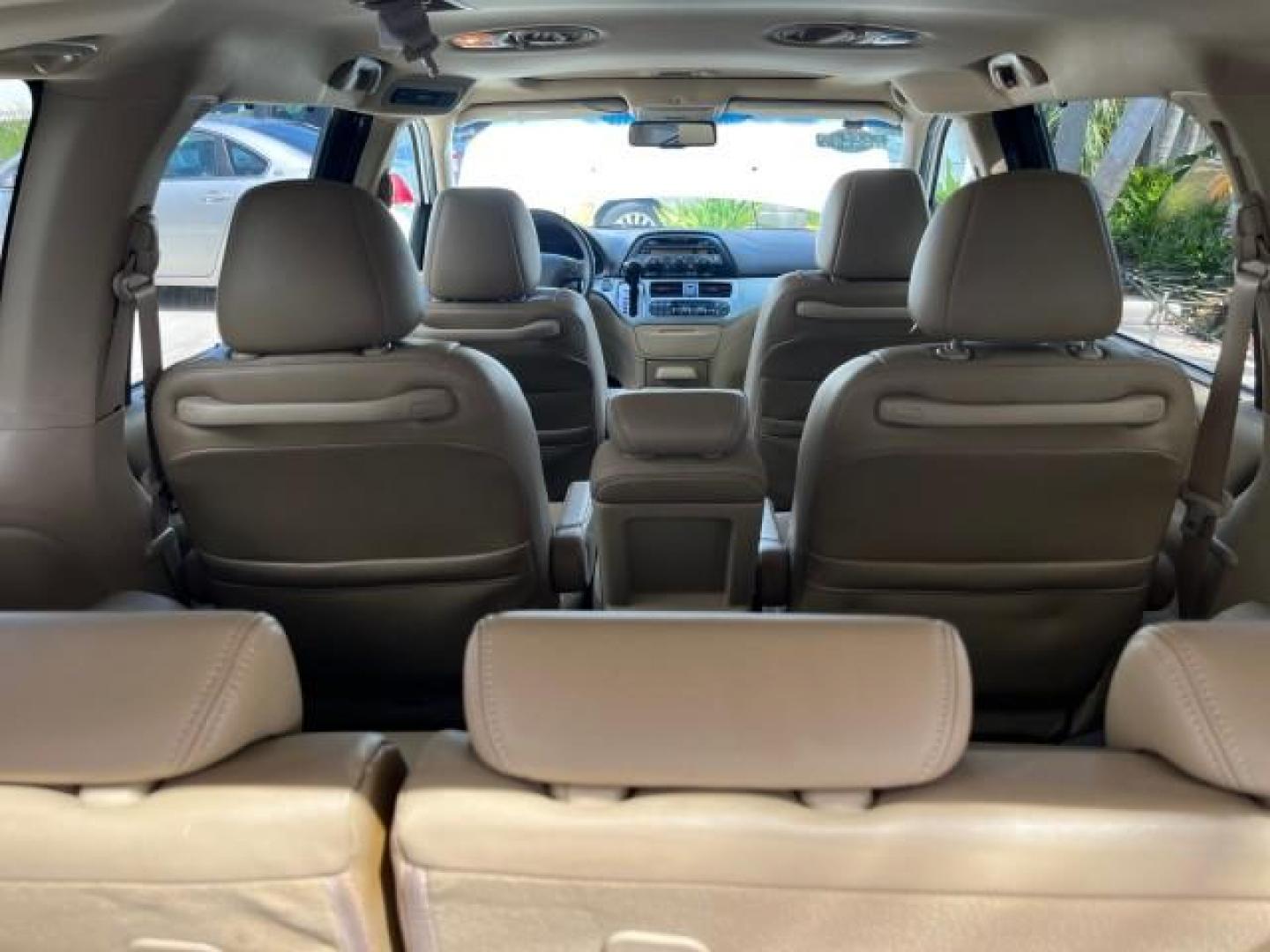 2010 Taffeta White /Ivory Honda Odyssey 1 FL EX-L LOW MILES 60,630 (5FNRL3H69AB) with an 3.5L SOHC MPFI 24-Valve i-VTEC V6 Engine engine, Automatic transmission, located at 4701 North Dixie Hwy, Pompano Beach, FL, 33064, (954) 422-2889, 26.240938, -80.123474 - OUR WEBPAGE FLORIDACARS1.COM HAS OVER 100 PHOTOS AND FREE CARFAX LINK 2010 HONDA ODYSSEY EX-L ROAD READY 3.5L V6 VIN: 5FNRL3H69AB062878 POWER LIFTGATE NO ACCIDENTS NO RECALLS VAN 1 OWNER FLORIDA 3 ROW LEATHER SEATS 3.5L V6 F SOHC 24V LOW MILES 60,630 POWER SUNROOF GASOLINE BACK UP CAMERA POWER SLIDI - Photo#67