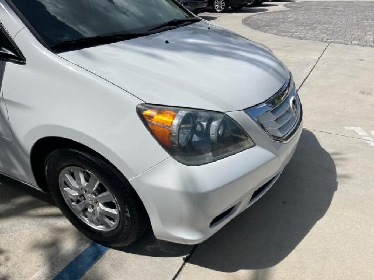 2010 Taffeta White /Ivory Honda Odyssey 1 FL EX-L LOW MILES 60,630 (5FNRL3H69AB) with an 3.5L SOHC MPFI 24-Valve i-VTEC V6 Engine engine, Automatic transmission, located at 4701 North Dixie Hwy, Pompano Beach, FL, 33064, (954) 422-2889, 26.240938, -80.123474 - OUR WEBPAGE FLORIDACARS1.COM HAS OVER 100 PHOTOS AND FREE CARFAX LINK 2010 HONDA ODYSSEY EX-L ROAD READY 3.5L V6 VIN: 5FNRL3H69AB062878 POWER LIFTGATE NO ACCIDENTS NO RECALLS VAN 1 OWNER FLORIDA 3 ROW LEATHER SEATS 3.5L V6 F SOHC 24V LOW MILES 60,630 POWER SUNROOF GASOLINE BACK UP CAMERA POWER SLIDI - Photo#84