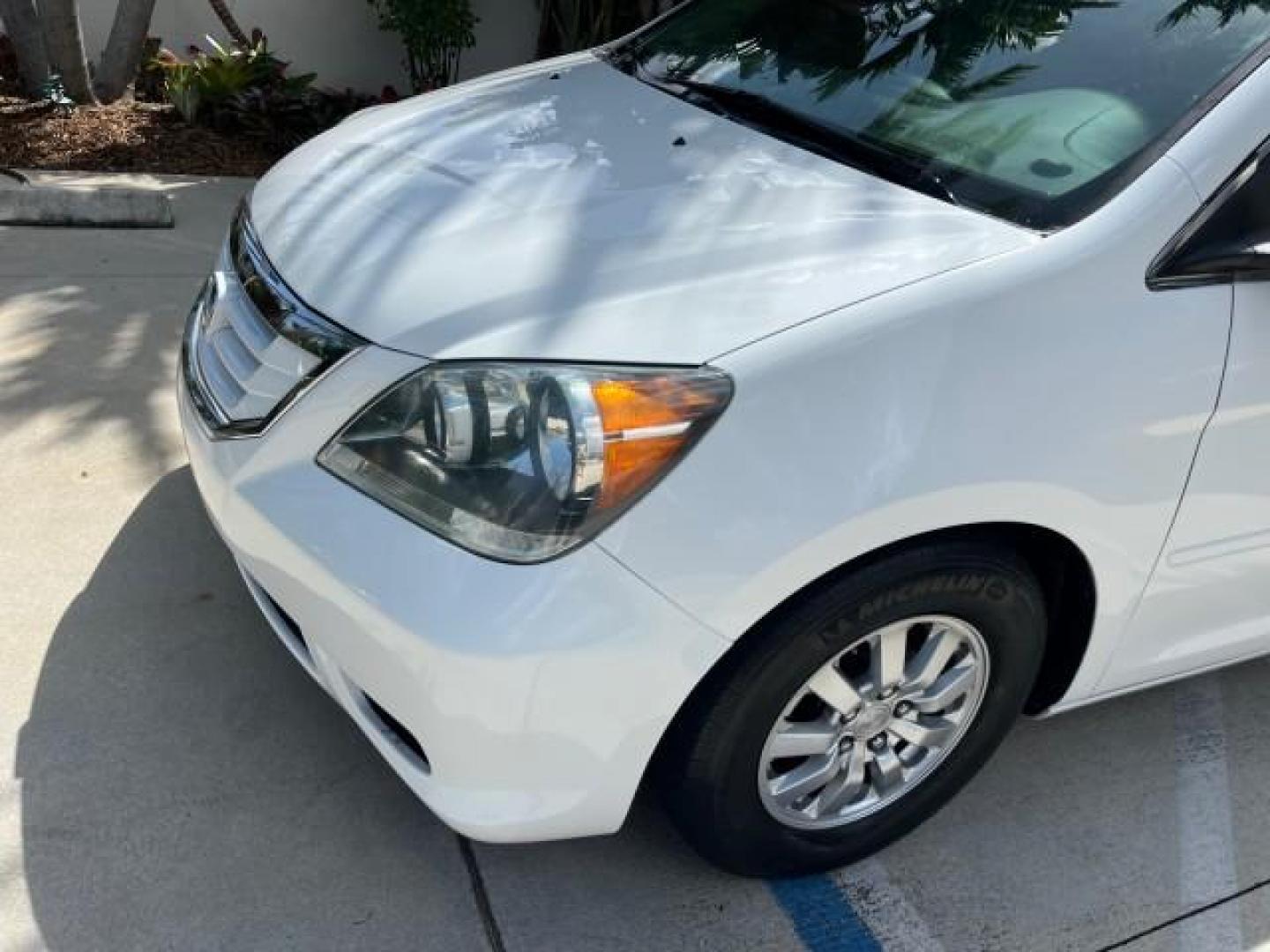 2010 Taffeta White /Ivory Honda Odyssey 1 FL EX-L LOW MILES 60,630 (5FNRL3H69AB) with an 3.5L SOHC MPFI 24-Valve i-VTEC V6 Engine engine, Automatic transmission, located at 4701 North Dixie Hwy, Pompano Beach, FL, 33064, (954) 422-2889, 26.240938, -80.123474 - OUR WEBPAGE FLORIDACARS1.COM HAS OVER 100 PHOTOS AND FREE CARFAX LINK 2010 HONDA ODYSSEY EX-L ROAD READY 3.5L V6 VIN: 5FNRL3H69AB062878 POWER LIFTGATE NO ACCIDENTS NO RECALLS VAN 1 OWNER FLORIDA 3 ROW LEATHER SEATS 3.5L V6 F SOHC 24V LOW MILES 60,630 POWER SUNROOF GASOLINE BACK UP CAMERA POWER SLIDI - Photo#85