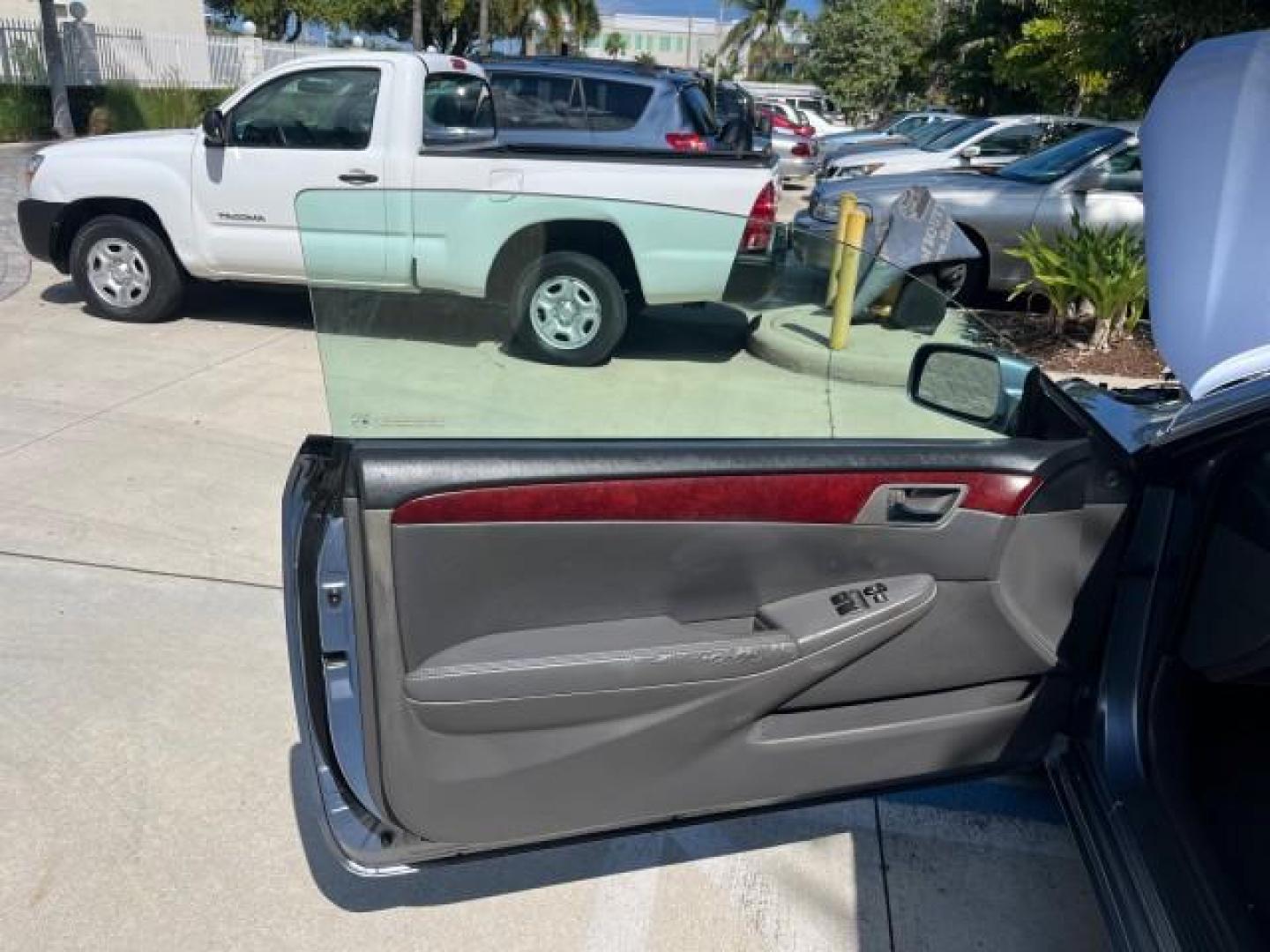 2004 Cosmic Blue Metallic /Dark Stone Toyota Camry Solara CONV 1 FL SLE LOW MILES 85,543 (4T1FA38P94U) with an 3.3L DOHC SMPI VVT-i 24-Valve V6 Engine engine, Automatic transmission, located at 4701 North Dixie Hwy, Pompano Beach, FL, 33064, (954) 422-2889, 26.240938, -80.123474 - OUR WEBPAGE FLORIDACARS1.COM HAS OVER 100 PHOTOS AND FREE CARFAX LINK 2004 TOYOTA CAMRY SOLARA SE V6 ROAD READY 3.3L V6 VIN: 4T1FA38P94U034135 NO RECALLS 29 MPG CONVERTIBLE POWER CONVERTIBLE TOP 3.3L V6 F DOHC 24V POWER LEATHER SEATS GASOLINE 1 OWNER FLORIDA FRONT WHEEL DRIVE 10 SERVICE RECORDS LOW - Photo#10