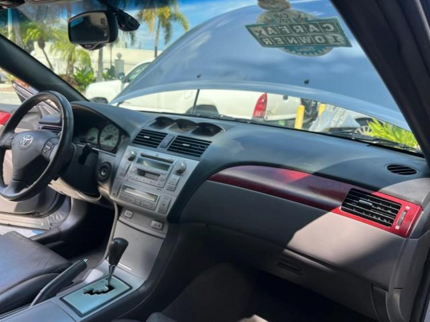 2004 Cosmic Blue Metallic /Dark Stone Toyota Camry Solara CONV 1 FL SLE LOW MILES 85,543 (4T1FA38P94U) with an 3.3L DOHC SMPI VVT-i 24-Valve V6 Engine engine, Automatic transmission, located at 4701 North Dixie Hwy, Pompano Beach, FL, 33064, (954) 422-2889, 26.240938, -80.123474 - OUR WEBPAGE FLORIDACARS1.COM HAS OVER 100 PHOTOS AND FREE CARFAX LINK 2004 TOYOTA CAMRY SOLARA SE V6 ROAD READY 3.3L V6 VIN: 4T1FA38P94U034135 NO RECALLS 29 MPG CONVERTIBLE POWER CONVERTIBLE TOP 3.3L V6 F DOHC 24V POWER LEATHER SEATS GASOLINE 1 OWNER FLORIDA FRONT WHEEL DRIVE 10 SERVICE RECORDS LOW - Photo#25