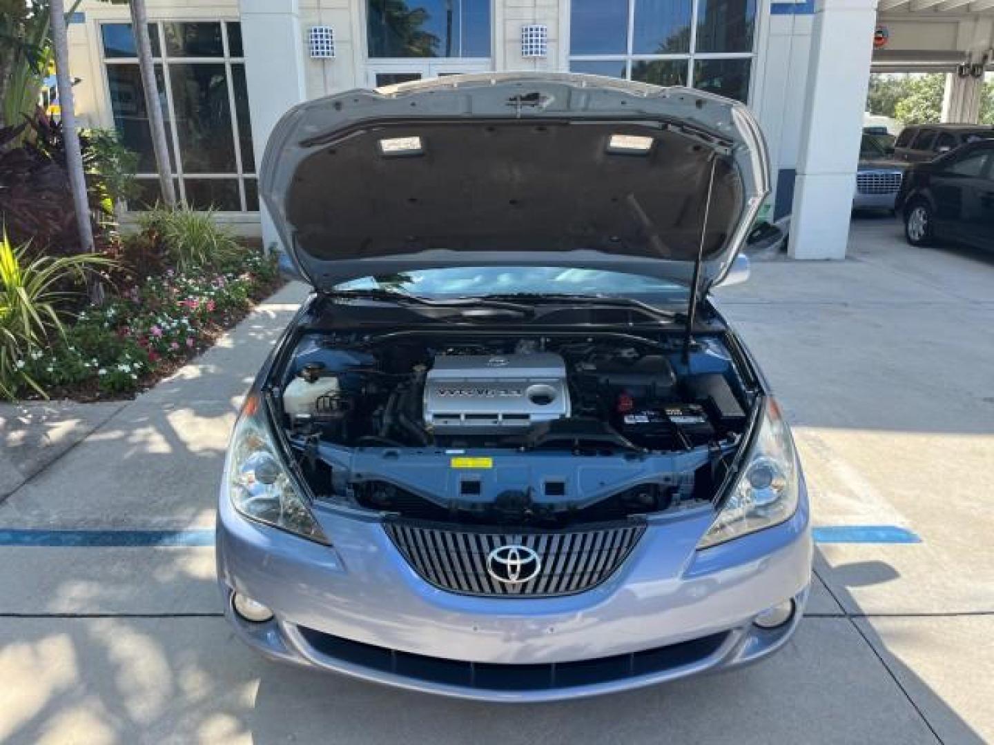 2004 Cosmic Blue Metallic /Dark Stone Toyota Camry Solara CONV 1 FL SLE LOW MILES 85,543 (4T1FA38P94U) with an 3.3L DOHC SMPI VVT-i 24-Valve V6 Engine engine, Automatic transmission, located at 4701 North Dixie Hwy, Pompano Beach, FL, 33064, (954) 422-2889, 26.240938, -80.123474 - OUR WEBPAGE FLORIDACARS1.COM HAS OVER 100 PHOTOS AND FREE CARFAX LINK 2004 TOYOTA CAMRY SOLARA SE V6 ROAD READY 3.3L V6 VIN: 4T1FA38P94U034135 NO RECALLS 29 MPG CONVERTIBLE POWER CONVERTIBLE TOP 3.3L V6 F DOHC 24V POWER LEATHER SEATS GASOLINE 1 OWNER FLORIDA FRONT WHEEL DRIVE 10 SERVICE RECORDS LOW - Photo#62