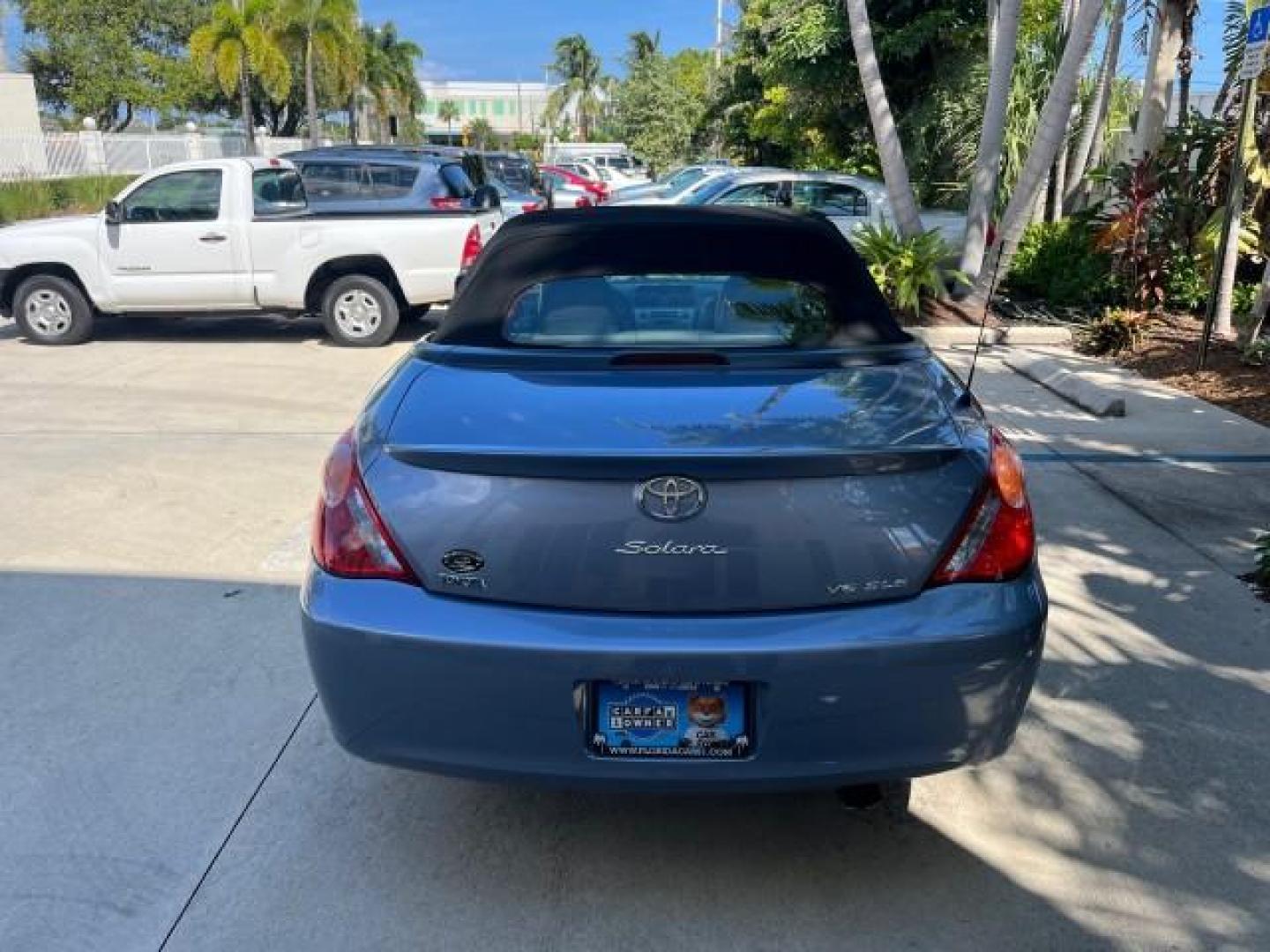 2004 Cosmic Blue Metallic /Dark Stone Toyota Camry Solara CONV 1 FL SLE LOW MILES 85,543 (4T1FA38P94U) with an 3.3L DOHC SMPI VVT-i 24-Valve V6 Engine engine, Automatic transmission, located at 4701 North Dixie Hwy, Pompano Beach, FL, 33064, (954) 422-2889, 26.240938, -80.123474 - OUR WEBPAGE FLORIDACARS1.COM HAS OVER 100 PHOTOS AND FREE CARFAX LINK 2004 TOYOTA CAMRY SOLARA SE V6 ROAD READY 3.3L V6 VIN: 4T1FA38P94U034135 NO RECALLS 29 MPG CONVERTIBLE POWER CONVERTIBLE TOP 3.3L V6 F DOHC 24V POWER LEATHER SEATS GASOLINE 1 OWNER FLORIDA FRONT WHEEL DRIVE 10 SERVICE RECORDS LOW - Photo#6