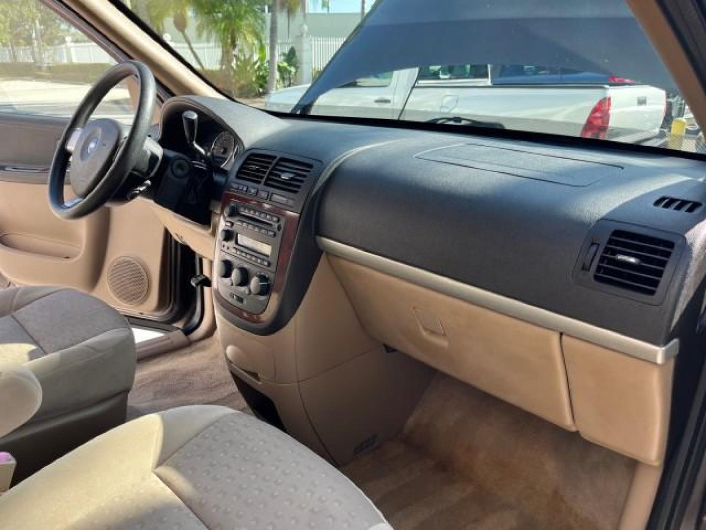 2008 Desert Brown Metallic /Cashmere Chevrolet Uplander VAN LS LOW MILES 47,919 (1GNDV23168D) with an 3.9L V6 SFI Engine engine, Automatic transmission, located at 4701 North Dixie Hwy, Pompano Beach, FL, 33064, (954) 422-2889, 26.240938, -80.123474 - OUR WEBPAGE FLORIDACARS1.COM HAS OVER 100 PHOTOS AND FREE CARFAX LINK 2008 CHEVROLET UPLANDER LS ROAD READY 3.9L V6 VIN: 1GNDV23168D130721 NO ACCIDENTS VAN NO RECALLS 25 MPG 3.9L V6 F LOW MILES 47,919 GASOLINE 3 ROW SEATS FRONT WHEEL DRIVE POWER SEATS/MIRRORS 12 SERVICE RECORDS Anti-Theft System Con - Photo#26