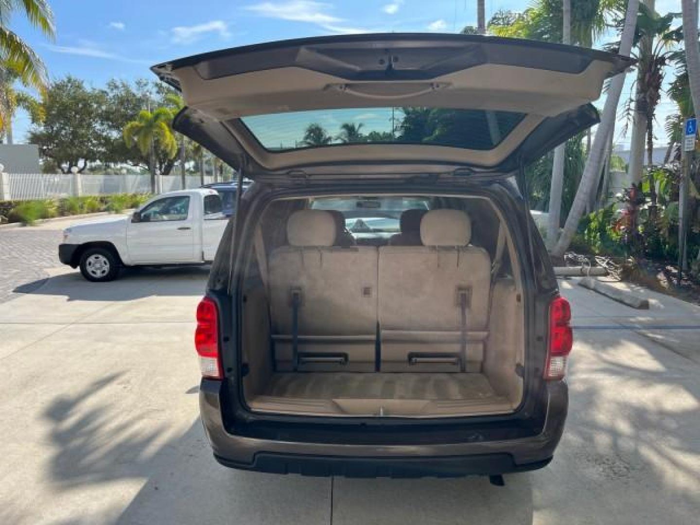 2008 Desert Brown Metallic /Cashmere Chevrolet Uplander VAN LS LOW MILES 47,919 (1GNDV23168D) with an 3.9L V6 SFI Engine engine, Automatic transmission, located at 4701 North Dixie Hwy, Pompano Beach, FL, 33064, (954) 422-2889, 26.240938, -80.123474 - OUR WEBPAGE FLORIDACARS1.COM HAS OVER 100 PHOTOS AND FREE CARFAX LINK 2008 CHEVROLET UPLANDER LS ROAD READY 3.9L V6 VIN: 1GNDV23168D130721 NO ACCIDENTS VAN NO RECALLS 25 MPG 3.9L V6 F LOW MILES 47,919 GASOLINE 3 ROW SEATS FRONT WHEEL DRIVE POWER SEATS/MIRRORS 12 SERVICE RECORDS Anti-Theft System Con - Photo#52