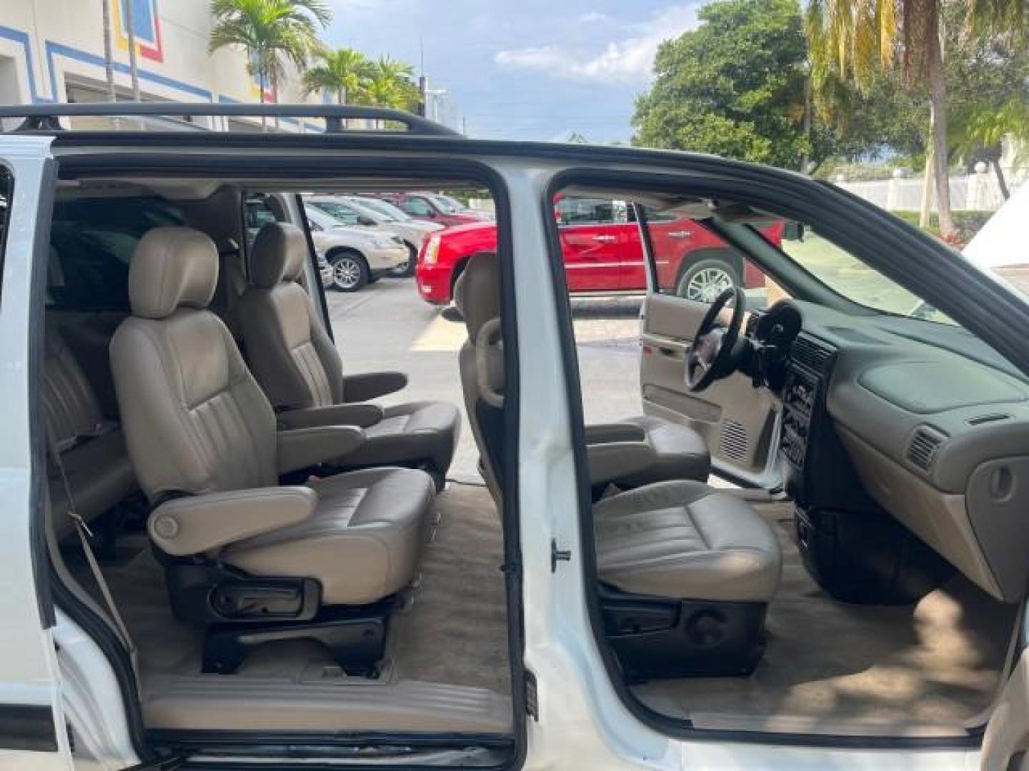 2002 Bright White /Neutral Chevrolet Venture LOW MILES 70,094 1 FL LT LEATHER LOW MILES 70,094 (1GNDX03E42D) with an 3.4L SFI V6 Engine engine, Automatic transmission, located at 4701 North Dixie Hwy, Pompano Beach, FL, 33064, (954) 422-2889, 26.240938, -80.123474 - OUR WEBPAGE FLORIDACARS1.COM HAS OVER 100 PHOTOS AND FREE CARFAX LINK 2002 CHEVROLET VENTURE LS ROAD READY 3.4L V6 VIN: 1GNDX03E42D210818 NO RECALLS 26 MPG VAN 1 OWNER FLORIDA 3.4L V6 F OHV 12V 3 ROW LEATHER SEATS GASOLINE DUAL AC LOW MILES 70,094 FRONT WHEEL DRIVE POWER SLIDING DOORS 17 SERVICE REC - Photo#12