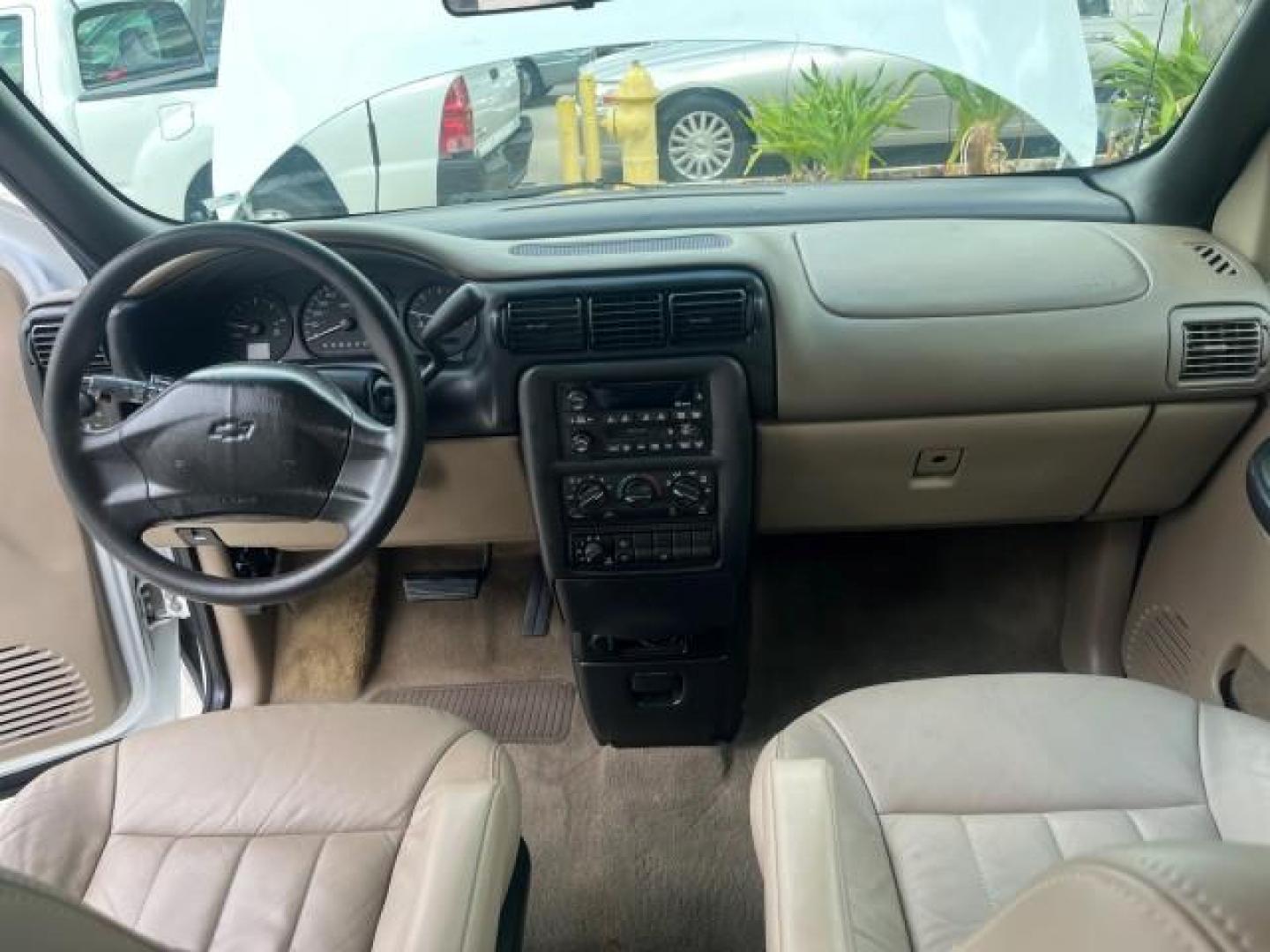 2002 Bright White /Neutral Chevrolet Venture LOW MILES 70,094 1 FL LT LEATHER LOW MILES 70,094 (1GNDX03E42D) with an 3.4L SFI V6 Engine engine, Automatic transmission, located at 4701 North Dixie Hwy, Pompano Beach, FL, 33064, (954) 422-2889, 26.240938, -80.123474 - OUR WEBPAGE FLORIDACARS1.COM HAS OVER 100 PHOTOS AND FREE CARFAX LINK 2002 CHEVROLET VENTURE LS ROAD READY 3.4L V6 VIN: 1GNDX03E42D210818 NO RECALLS 26 MPG VAN 1 OWNER FLORIDA 3.4L V6 F OHV 12V 3 ROW LEATHER SEATS GASOLINE DUAL AC LOW MILES 70,094 FRONT WHEEL DRIVE POWER SLIDING DOORS 17 SERVICE REC - Photo#33