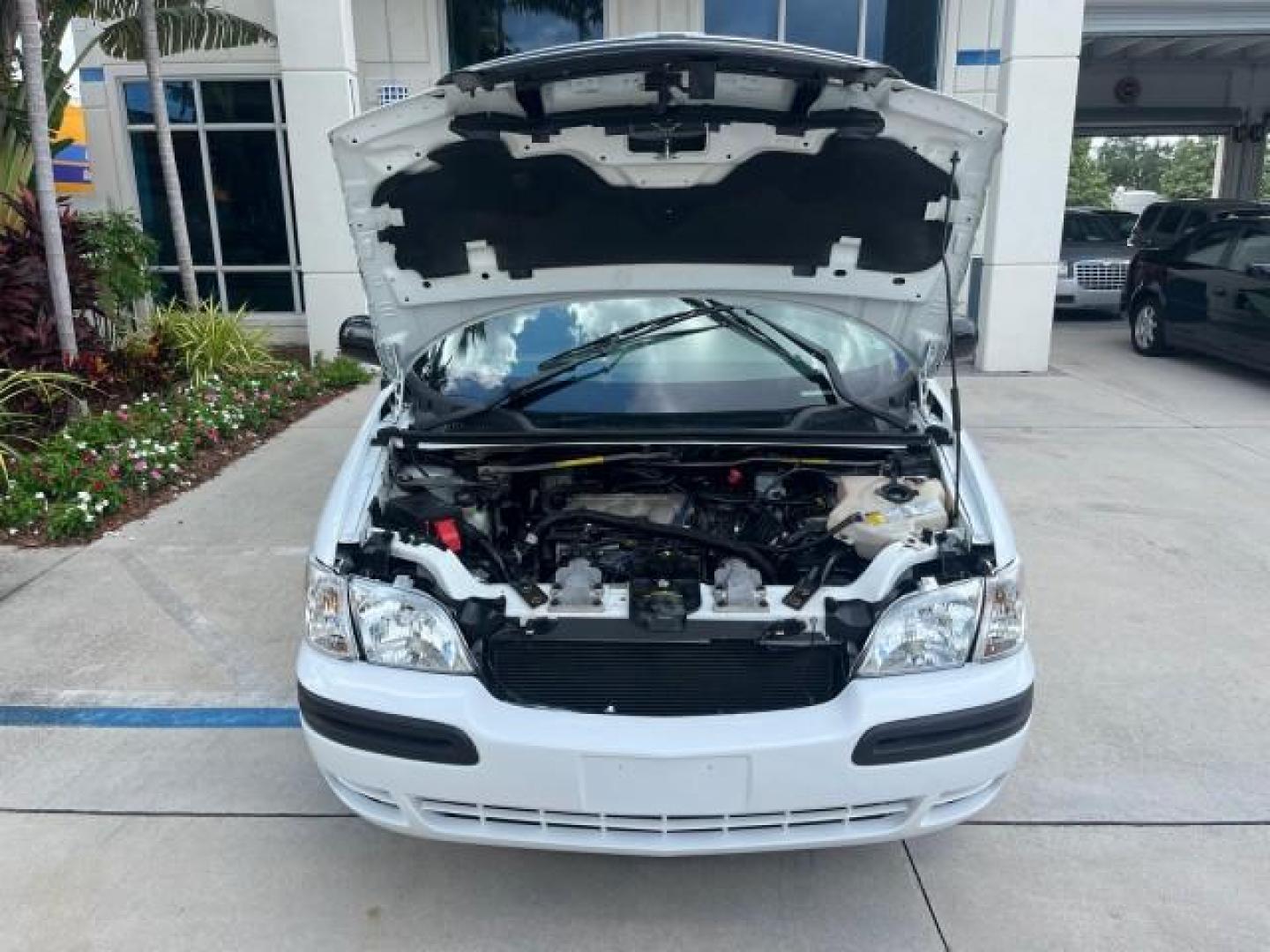 2002 Bright White /Neutral Chevrolet Venture LOW MILES 70,094 1 FL LT LEATHER LOW MILES 70,094 (1GNDX03E42D) with an 3.4L SFI V6 Engine engine, Automatic transmission, located at 4701 North Dixie Hwy, Pompano Beach, FL, 33064, (954) 422-2889, 26.240938, -80.123474 - OUR WEBPAGE FLORIDACARS1.COM HAS OVER 100 PHOTOS AND FREE CARFAX LINK 2002 CHEVROLET VENTURE LS ROAD READY 3.4L V6 VIN: 1GNDX03E42D210818 NO RECALLS 26 MPG VAN 1 OWNER FLORIDA 3.4L V6 F OHV 12V 3 ROW LEATHER SEATS GASOLINE DUAL AC LOW MILES 70,094 FRONT WHEEL DRIVE POWER SLIDING DOORS 17 SERVICE REC - Photo#66