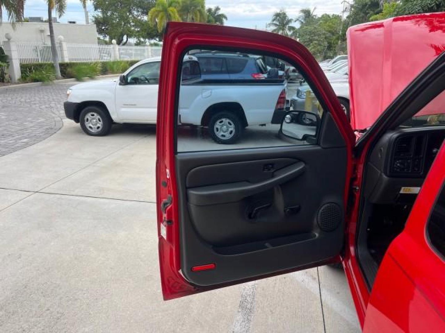 2005 Sport Red Metallic /Medium Gray Chevrolet Silverado 1500 4 DR LOW MILES 79,987 (1GCEC19X25Z) with an 4.3L Vortec 4300 V6 MFI Engine engine, Automatic transmission, located at 4701 North Dixie Hwy, Pompano Beach, FL, 33064, (954) 422-2889, 26.240938, -80.123474 - OUR WEBPAGE FLORIDACARS1.COM HAS OVER 100 PHOTOS AND FREE CARFAX LINK 2005 CHEVROLET SILVERADO 1500 ROAD READY WORK READY VIN: 1GCEC19X25Z205566 NO ACCIDENTS 6,6 FT BED 4 DOOR EXTENDED CAB PICKUP NO RECALLS 4.3L V6 4.3L V6 F FLORIDA OWNER GASOLINE BLUETOOTH LOW MILES 79,987 REAR WHEEL DRIVE BACK UP - Photo#9