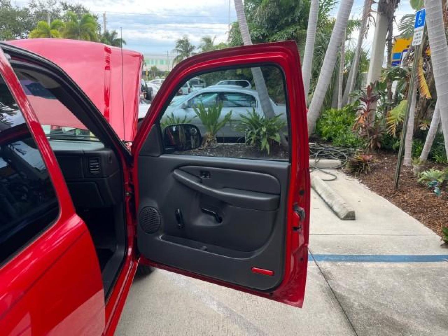 2005 Sport Red Metallic /Medium Gray Chevrolet Silverado 1500 4 DR LOW MILES 79,987 (1GCEC19X25Z) with an 4.3L Vortec 4300 V6 MFI Engine engine, Automatic transmission, located at 4701 North Dixie Hwy, Pompano Beach, FL, 33064, (954) 422-2889, 26.240938, -80.123474 - OUR WEBPAGE FLORIDACARS1.COM HAS OVER 100 PHOTOS AND FREE CARFAX LINK 2005 CHEVROLET SILVERADO 1500 ROAD READY WORK READY VIN: 1GCEC19X25Z205566 NO ACCIDENTS 6,6 FT BED 4 DOOR EXTENDED CAB PICKUP NO RECALLS 4.3L V6 4.3L V6 F FLORIDA OWNER GASOLINE BLUETOOTH LOW MILES 79,987 REAR WHEEL DRIVE BACK UP - Photo#11