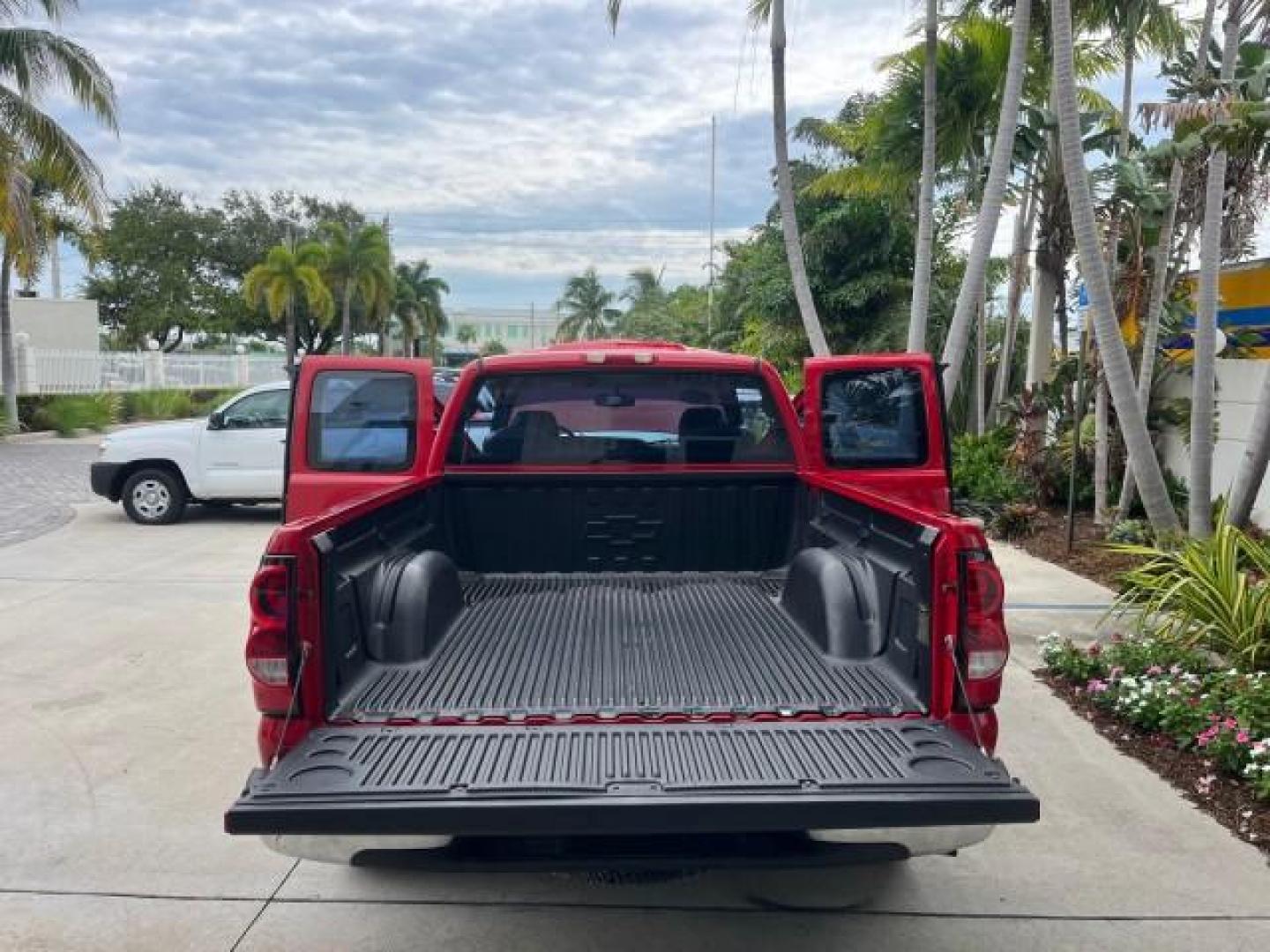 2005 Sport Red Metallic /Medium Gray Chevrolet Silverado 1500 4 DR LOW MILES 79,987 (1GCEC19X25Z) with an 4.3L Vortec 4300 V6 MFI Engine engine, Automatic transmission, located at 4701 North Dixie Hwy, Pompano Beach, FL, 33064, (954) 422-2889, 26.240938, -80.123474 - OUR WEBPAGE FLORIDACARS1.COM HAS OVER 100 PHOTOS AND FREE CARFAX LINK 2005 CHEVROLET SILVERADO 1500 ROAD READY WORK READY VIN: 1GCEC19X25Z205566 NO ACCIDENTS 6,6 FT BED 4 DOOR EXTENDED CAB PICKUP NO RECALLS 4.3L V6 4.3L V6 F FLORIDA OWNER GASOLINE BLUETOOTH LOW MILES 79,987 REAR WHEEL DRIVE BACK UP - Photo#15