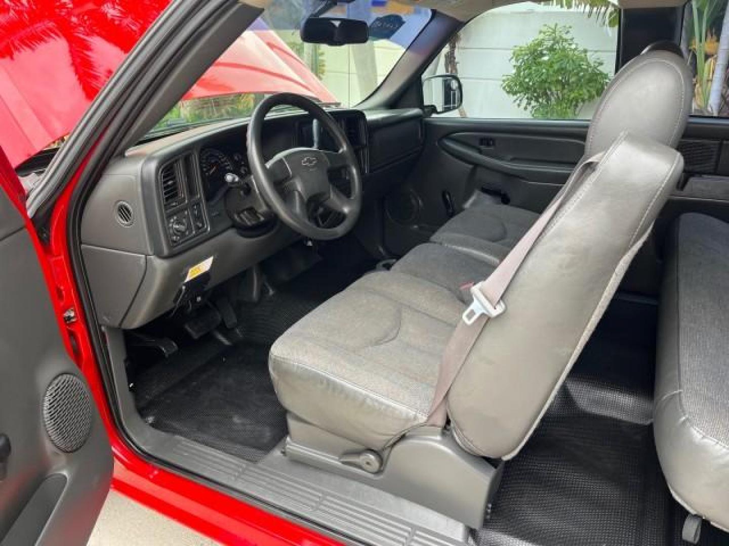 2005 Sport Red Metallic /Medium Gray Chevrolet Silverado 1500 4 DR LOW MILES 79,987 (1GCEC19X25Z) with an 4.3L Vortec 4300 V6 MFI Engine engine, Automatic transmission, located at 4701 North Dixie Hwy, Pompano Beach, FL, 33064, (954) 422-2889, 26.240938, -80.123474 - OUR WEBPAGE FLORIDACARS1.COM HAS OVER 100 PHOTOS AND FREE CARFAX LINK 2005 CHEVROLET SILVERADO 1500 ROAD READY WORK READY VIN: 1GCEC19X25Z205566 NO ACCIDENTS 6,6 FT BED 4 DOOR EXTENDED CAB PICKUP NO RECALLS 4.3L V6 4.3L V6 F FLORIDA OWNER GASOLINE BLUETOOTH LOW MILES 79,987 REAR WHEEL DRIVE BACK UP - Photo#33