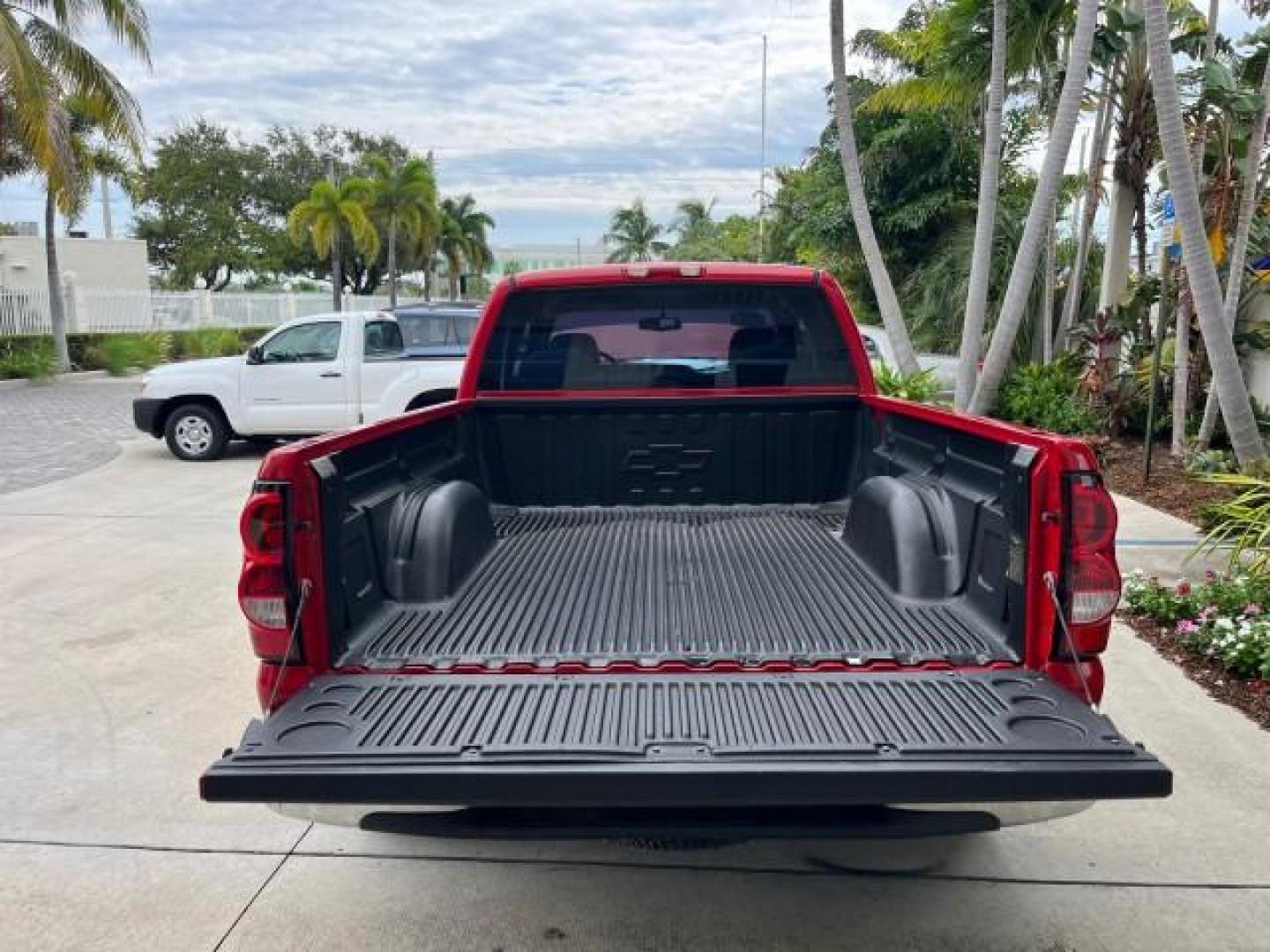 2005 Sport Red Metallic /Medium Gray Chevrolet Silverado 1500 4 DR LOW MILES 79,987 (1GCEC19X25Z) with an 4.3L Vortec 4300 V6 MFI Engine engine, Automatic transmission, located at 4701 North Dixie Hwy, Pompano Beach, FL, 33064, (954) 422-2889, 26.240938, -80.123474 - OUR WEBPAGE FLORIDACARS1.COM HAS OVER 100 PHOTOS AND FREE CARFAX LINK 2005 CHEVROLET SILVERADO 1500 ROAD READY WORK READY VIN: 1GCEC19X25Z205566 NO ACCIDENTS 6,6 FT BED 4 DOOR EXTENDED CAB PICKUP NO RECALLS 4.3L V6 4.3L V6 F FLORIDA OWNER GASOLINE BLUETOOTH LOW MILES 79,987 REAR WHEEL DRIVE BACK UP - Photo#51