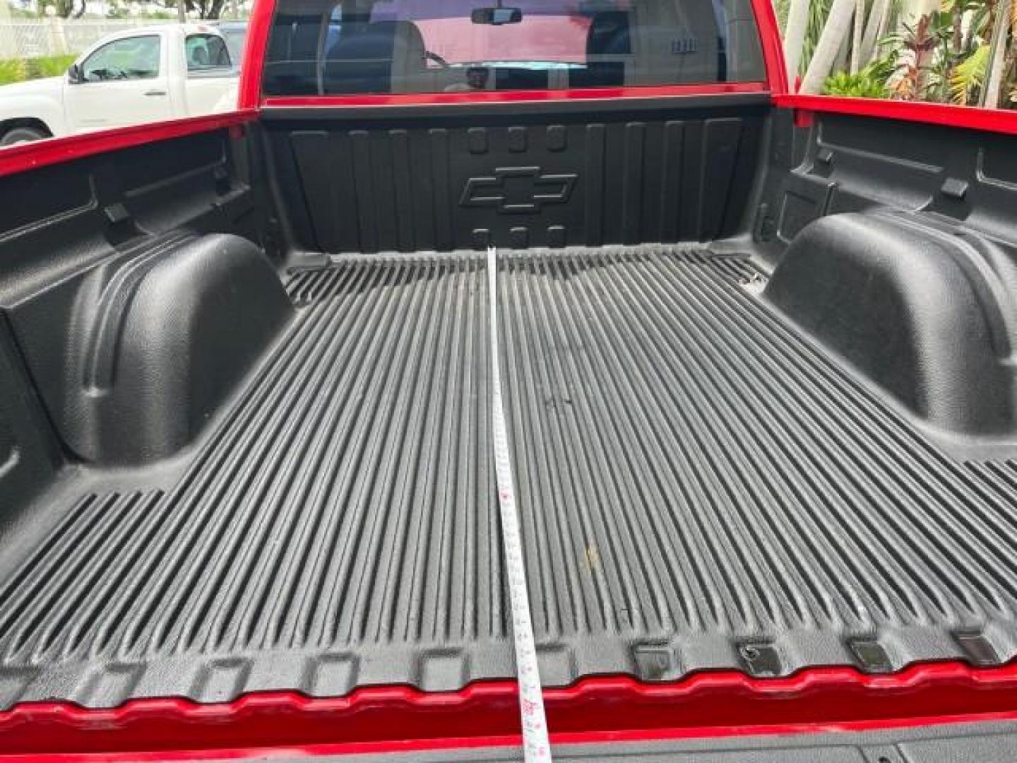 2005 Sport Red Metallic /Medium Gray Chevrolet Silverado 1500 4 DR LOW MILES 79,987 (1GCEC19X25Z) with an 4.3L Vortec 4300 V6 MFI Engine engine, Automatic transmission, located at 4701 North Dixie Hwy, Pompano Beach, FL, 33064, (954) 422-2889, 26.240938, -80.123474 - OUR WEBPAGE FLORIDACARS1.COM HAS OVER 100 PHOTOS AND FREE CARFAX LINK 2005 CHEVROLET SILVERADO 1500 ROAD READY WORK READY VIN: 1GCEC19X25Z205566 NO ACCIDENTS 6,6 FT BED 4 DOOR EXTENDED CAB PICKUP NO RECALLS 4.3L V6 4.3L V6 F FLORIDA OWNER GASOLINE BLUETOOTH LOW MILES 79,987 REAR WHEEL DRIVE BACK UP - Photo#52