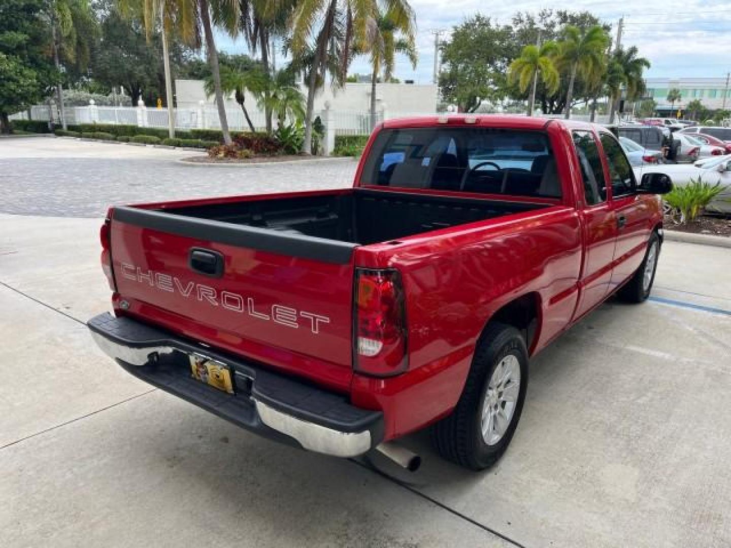 2005 Sport Red Metallic /Medium Gray Chevrolet Silverado 1500 4 DR LOW MILES 79,987 (1GCEC19X25Z) with an 4.3L Vortec 4300 V6 MFI Engine engine, Automatic transmission, located at 4701 North Dixie Hwy, Pompano Beach, FL, 33064, (954) 422-2889, 26.240938, -80.123474 - OUR WEBPAGE FLORIDACARS1.COM HAS OVER 100 PHOTOS AND FREE CARFAX LINK 2005 CHEVROLET SILVERADO 1500 ROAD READY WORK READY VIN: 1GCEC19X25Z205566 NO ACCIDENTS 6,6 FT BED 4 DOOR EXTENDED CAB PICKUP NO RECALLS 4.3L V6 4.3L V6 F FLORIDA OWNER GASOLINE BLUETOOTH LOW MILES 79,987 REAR WHEEL DRIVE BACK UP - Photo#85