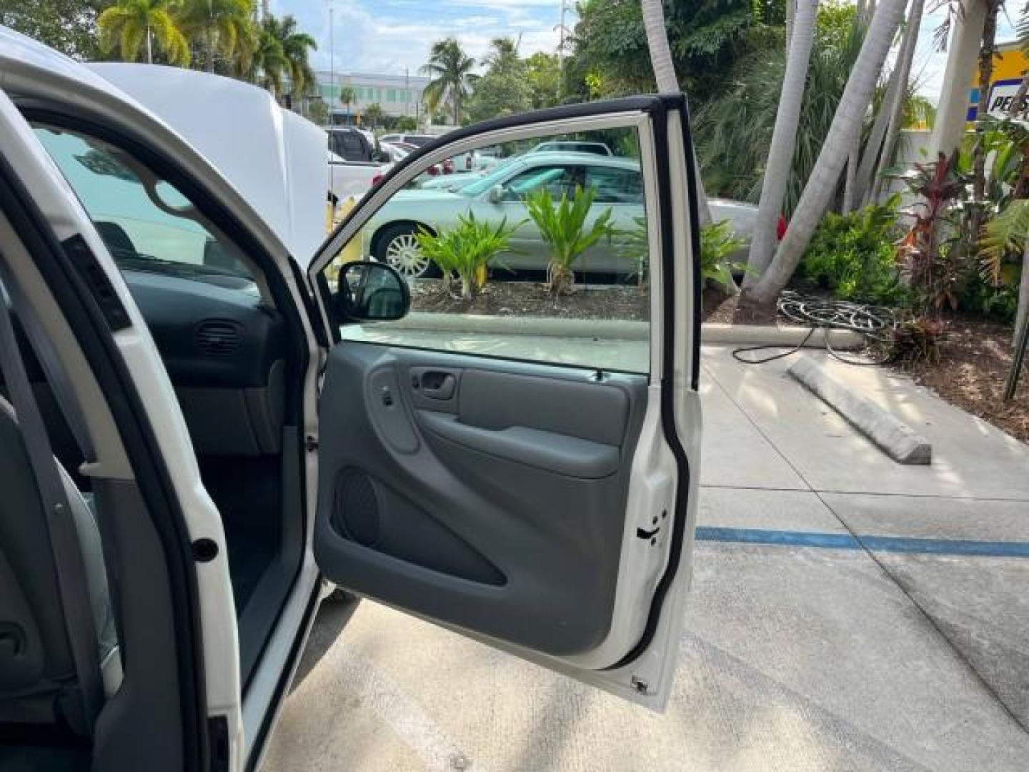 2005 Stone White /Med Slate Gray Chrysler Town and Country 1 OWNER LX LOW MILES 50,763 (2C4GP44R25R) with an 3.3L OHV SMPI V6 Engine engine, Automatic transmission, located at 4701 North Dixie Hwy, Pompano Beach, FL, 33064, (954) 422-2889, 26.240938, -80.123474 - OUR WEBPAGE FLORIDACARS1.COM HAS OVER 100 PHOTOS AND FREE CARFAX LINK 2005 CHRYSLER TOWN AND COUNTRY LX ROAD READY 3.3L V6 VIN: 2C4GP44R25R227228 NO ACCIDENTS VAN NO RECALLS 3.3L V6 F OHV 24V 1 OWNER 26 MPG GASOLINE POWER SEATS/MIRRORS LOW MILES 50,763 FRONT WHEEL DRIVE 40 SERVICE RECORDS 3 ROW SEAT - Photo#11