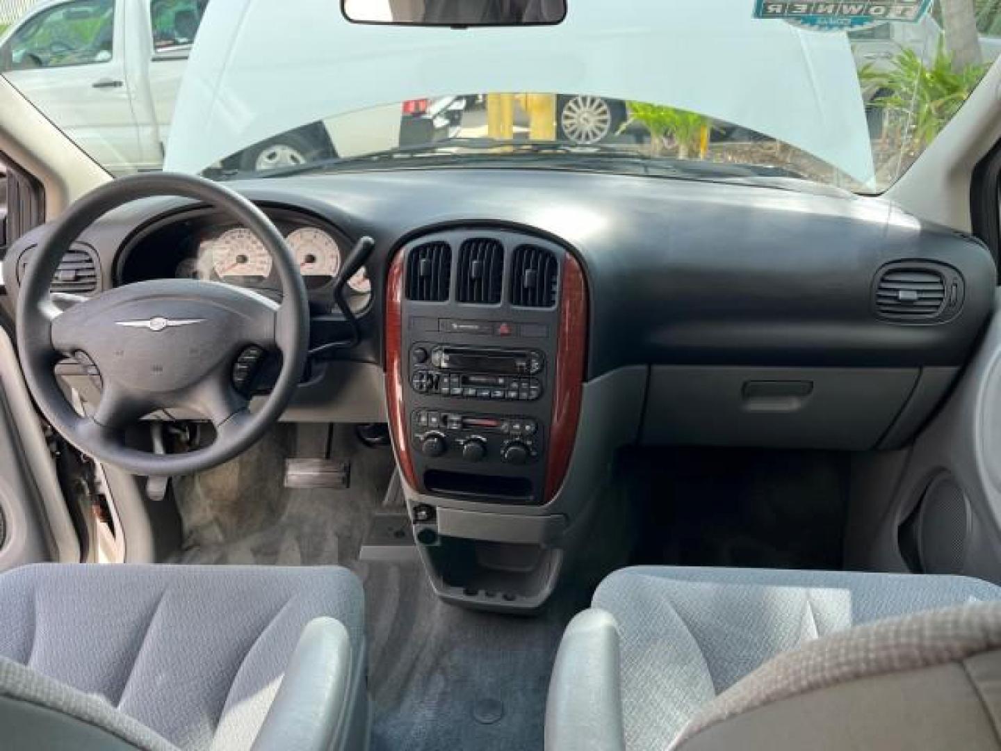 2005 Stone White /Med Slate Gray Chrysler Town and Country 1 OWNER LX LOW MILES 50,763 (2C4GP44R25R) with an 3.3L OHV SMPI V6 Engine engine, Automatic transmission, located at 4701 North Dixie Hwy, Pompano Beach, FL, 33064, (954) 422-2889, 26.240938, -80.123474 - OUR WEBPAGE FLORIDACARS1.COM HAS OVER 100 PHOTOS AND FREE CARFAX LINK 2005 CHRYSLER TOWN AND COUNTRY LX ROAD READY 3.3L V6 VIN: 2C4GP44R25R227228 NO ACCIDENTS VAN NO RECALLS 3.3L V6 F OHV 24V 1 OWNER 26 MPG GASOLINE POWER SEATS/MIRRORS LOW MILES 50,763 FRONT WHEEL DRIVE 40 SERVICE RECORDS 3 ROW SEAT - Photo#39