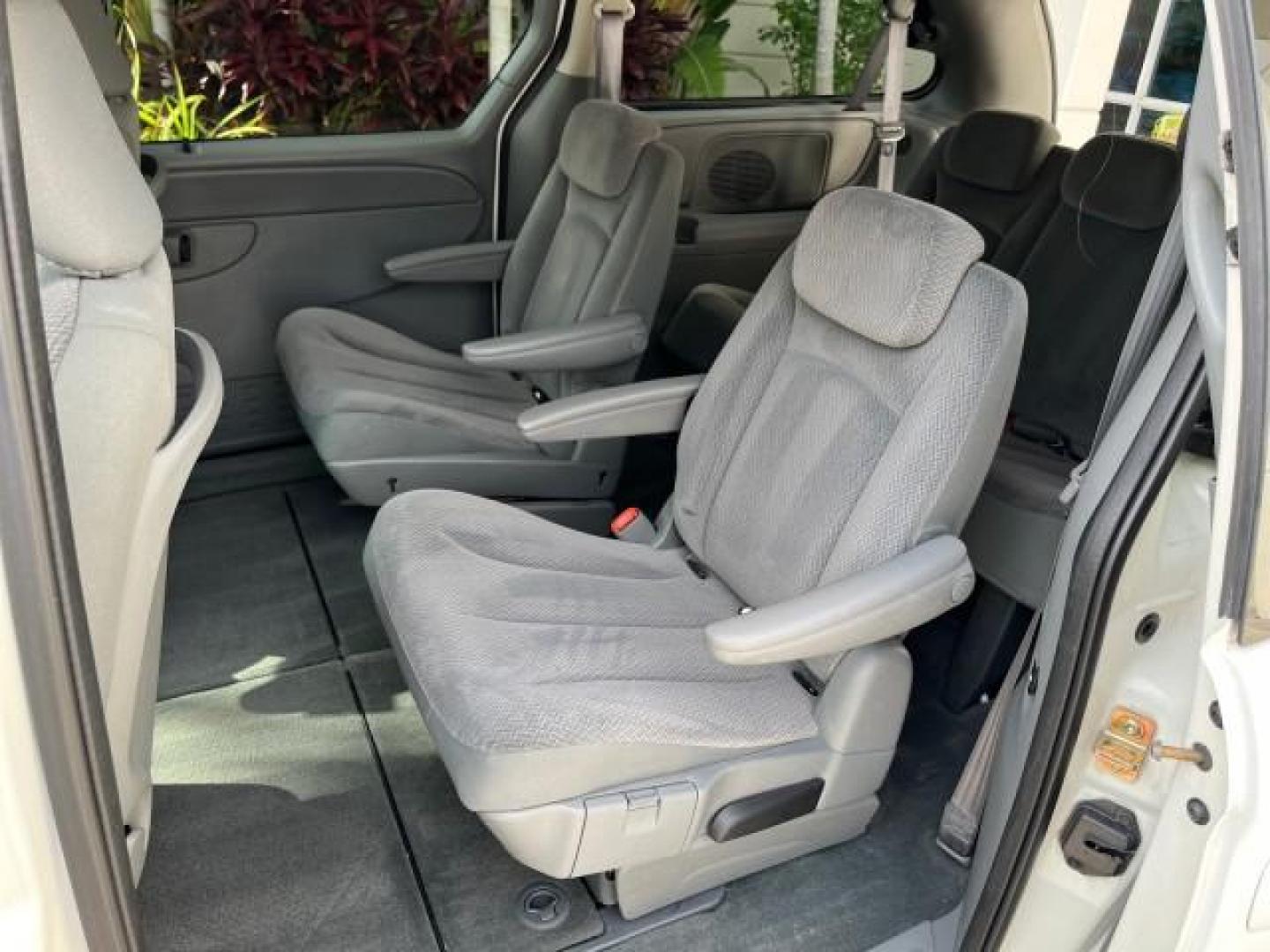 2005 Stone White /Med Slate Gray Chrysler Town and Country 1 OWNER LX LOW MILES 50,763 (2C4GP44R25R) with an 3.3L OHV SMPI V6 Engine engine, Automatic transmission, located at 4701 North Dixie Hwy, Pompano Beach, FL, 33064, (954) 422-2889, 26.240938, -80.123474 - OUR WEBPAGE FLORIDACARS1.COM HAS OVER 100 PHOTOS AND FREE CARFAX LINK 2005 CHRYSLER TOWN AND COUNTRY LX ROAD READY 3.3L V6 VIN: 2C4GP44R25R227228 NO ACCIDENTS VAN NO RECALLS 3.3L V6 F OHV 24V 1 OWNER 26 MPG GASOLINE POWER SEATS/MIRRORS LOW MILES 50,763 FRONT WHEEL DRIVE 40 SERVICE RECORDS 3 ROW SEAT - Photo#44