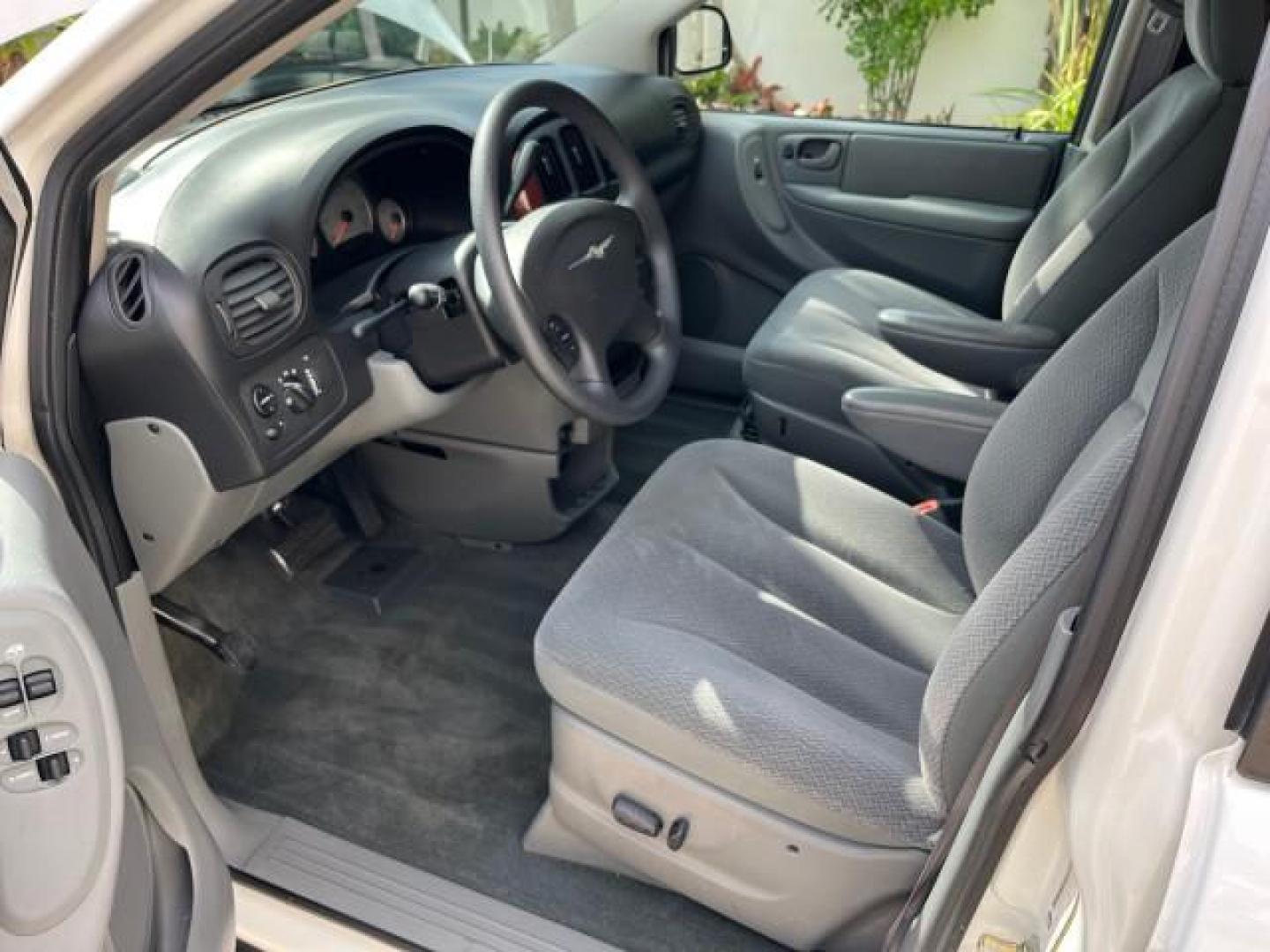 2005 Stone White /Med Slate Gray Chrysler Town and Country 1 OWNER LX LOW MILES 50,763 (2C4GP44R25R) with an 3.3L OHV SMPI V6 Engine engine, Automatic transmission, located at 4701 North Dixie Hwy, Pompano Beach, FL, 33064, (954) 422-2889, 26.240938, -80.123474 - OUR WEBPAGE FLORIDACARS1.COM HAS OVER 100 PHOTOS AND FREE CARFAX LINK 2005 CHRYSLER TOWN AND COUNTRY LX ROAD READY 3.3L V6 VIN: 2C4GP44R25R227228 NO ACCIDENTS VAN NO RECALLS 3.3L V6 F OHV 24V 1 OWNER 26 MPG GASOLINE POWER SEATS/MIRRORS LOW MILES 50,763 FRONT WHEEL DRIVE 40 SERVICE RECORDS 3 ROW SEAT - Photo#52