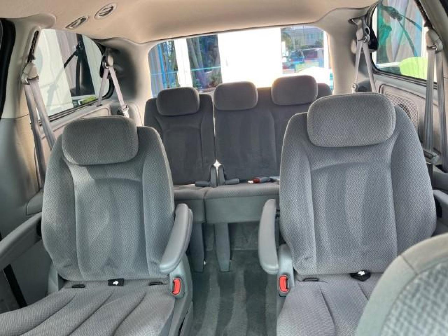 2005 Stone White /Med Slate Gray Chrysler Town and Country 1 OWNER LX LOW MILES 50,763 (2C4GP44R25R) with an 3.3L OHV SMPI V6 Engine engine, Automatic transmission, located at 4701 North Dixie Hwy, Pompano Beach, FL, 33064, (954) 422-2889, 26.240938, -80.123474 - OUR WEBPAGE FLORIDACARS1.COM HAS OVER 100 PHOTOS AND FREE CARFAX LINK 2005 CHRYSLER TOWN AND COUNTRY LX ROAD READY 3.3L V6 VIN: 2C4GP44R25R227228 NO ACCIDENTS VAN NO RECALLS 3.3L V6 F OHV 24V 1 OWNER 26 MPG GASOLINE POWER SEATS/MIRRORS LOW MILES 50,763 FRONT WHEEL DRIVE 40 SERVICE RECORDS 3 ROW SEAT - Photo#68