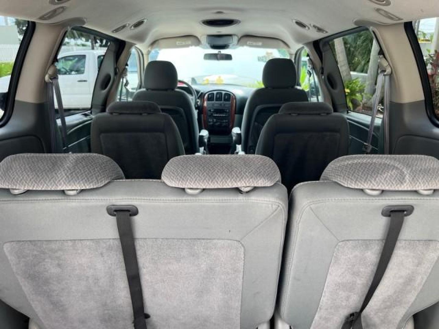 2005 Stone White /Med Slate Gray Chrysler Town and Country 1 OWNER LX LOW MILES 50,763 (2C4GP44R25R) with an 3.3L OHV SMPI V6 Engine engine, Automatic transmission, located at 4701 North Dixie Hwy, Pompano Beach, FL, 33064, (954) 422-2889, 26.240938, -80.123474 - OUR WEBPAGE FLORIDACARS1.COM HAS OVER 100 PHOTOS AND FREE CARFAX LINK 2005 CHRYSLER TOWN AND COUNTRY LX ROAD READY 3.3L V6 VIN: 2C4GP44R25R227228 NO ACCIDENTS VAN NO RECALLS 3.3L V6 F OHV 24V 1 OWNER 26 MPG GASOLINE POWER SEATS/MIRRORS LOW MILES 50,763 FRONT WHEEL DRIVE 40 SERVICE RECORDS 3 ROW SEAT - Photo#77