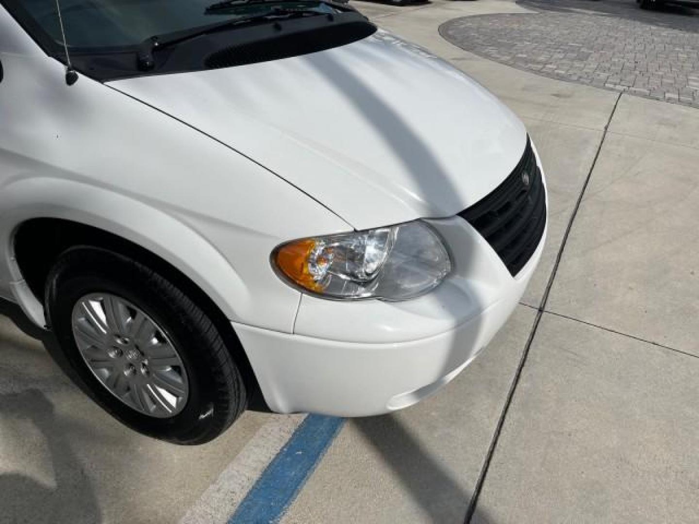 2005 Stone White /Med Slate Gray Chrysler Town and Country 1 OWNER LX LOW MILES 50,763 (2C4GP44R25R) with an 3.3L OHV SMPI V6 Engine engine, Automatic transmission, located at 4701 North Dixie Hwy, Pompano Beach, FL, 33064, (954) 422-2889, 26.240938, -80.123474 - OUR WEBPAGE FLORIDACARS1.COM HAS OVER 100 PHOTOS AND FREE CARFAX LINK 2005 CHRYSLER TOWN AND COUNTRY LX ROAD READY 3.3L V6 VIN: 2C4GP44R25R227228 NO ACCIDENTS VAN NO RECALLS 3.3L V6 F OHV 24V 1 OWNER 26 MPG GASOLINE POWER SEATS/MIRRORS LOW MILES 50,763 FRONT WHEEL DRIVE 40 SERVICE RECORDS 3 ROW SEAT - Photo#88