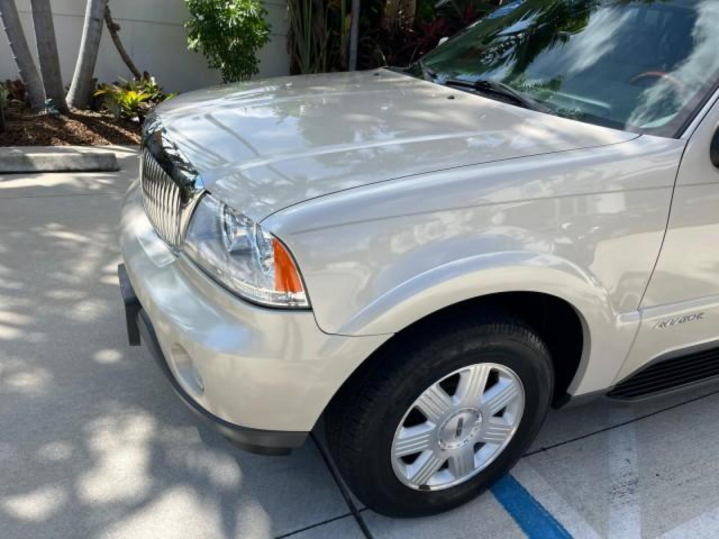 2005 Light French Silk Metallic /Camel Lincoln Aviator SUV LOW MILES 80,310 (5LMEU68H75Z) with an 4.6L DOHC 32-Valve V8 Engine engine, Automatic transmission, located at 4701 North Dixie Hwy, Pompano Beach, FL, 33064, (954) 422-2889, 26.240938, -80.123474 - OUR WEBPAGE FLORIDACARS1.COM HAS OVER 100 PHOTOS AND FREE CARFAX LINK 2005 LINCOLN AVIATOR LUXURY ROAD READY 4.6L V8 VIN: 5LMEU68H75ZJ19344 NO ACCIDENTS 4 DOOR WAGON/SPORT UTILITY NO RECALLS FL OWNER 4.6L V8 F DOHC LOW MILES 80,310 GASOLINE PARK SENSORS 3 ROW LEATHER SEATS REAR WHEEL DRIVE 15 SERVIC - Photo#97