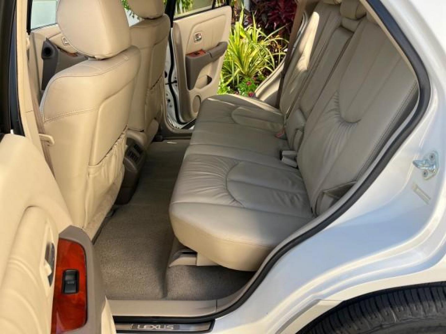 2002 White Gold Crystal /Ivory Lexus RX 300 1 FL LOW MILES 60,785 (JTJHF10U620) with an 3.0L Aluminum 24-Valve V6 Engine engine, Automatic transmission, located at 4701 North Dixie Hwy, Pompano Beach, FL, 33064, (954) 422-2889, 26.240938, -80.123474 - OUR WEBPAGE FLORIDACARS1.COM HAS OVER 100 PHOTOS AND FREE CARFAX LINK 2002 LEXUS RX 300 ROAD READY 3.OL V6 VIN: JTJHF10U620245623 NO RECALLS SUNROOF 4 DOOR WAGON/SPORT UTILITY ALL WHEEL DRIVE 3.0L V6 F 24V POWER LEATHER SEATS GASOLINE 1 OWNER FLORIDA ALL WHEEL DRIVE NEW $44,382 LOW MILES 60,785 AWD - Photo#14