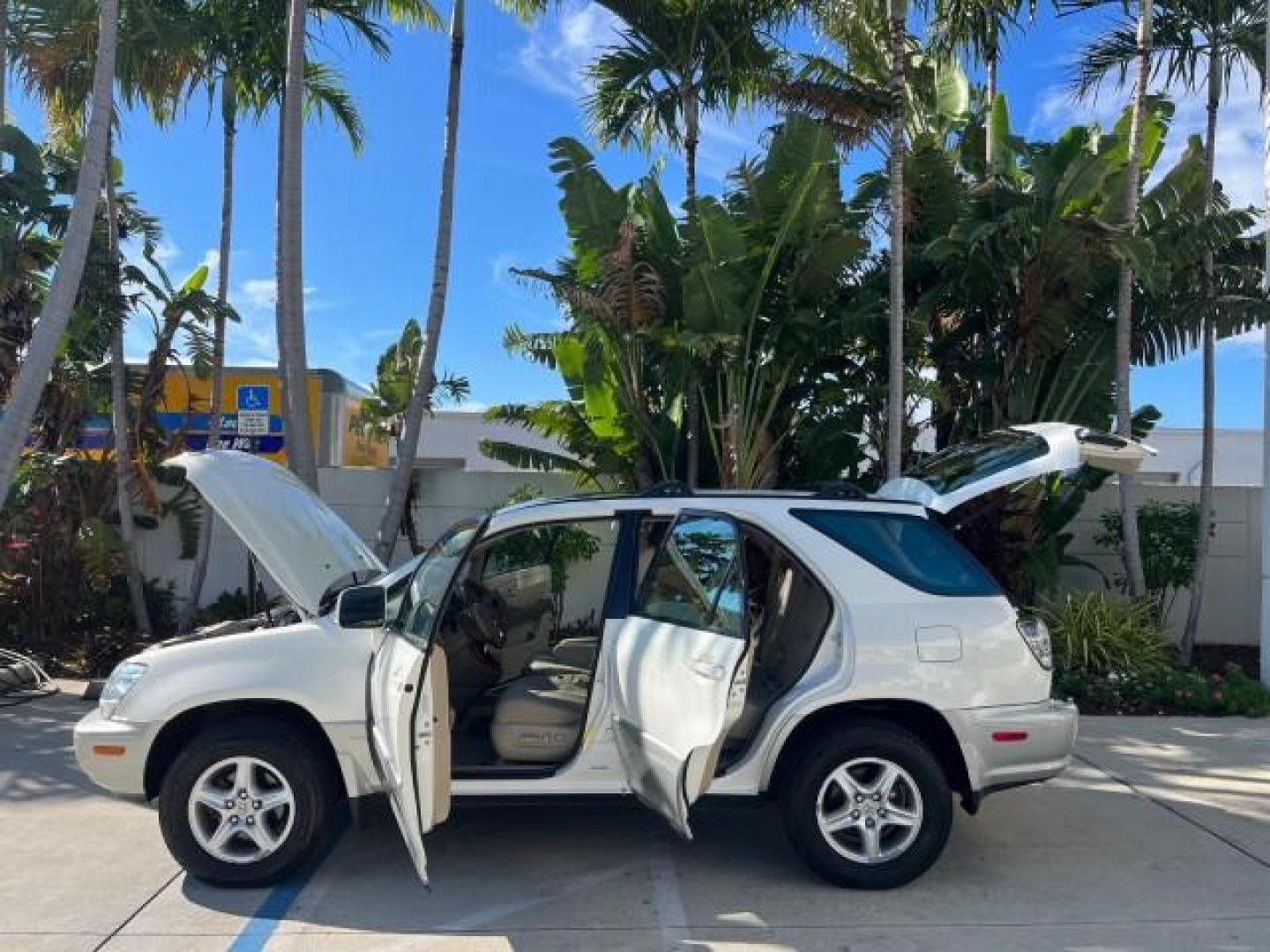 2002 White Gold Crystal /Ivory Lexus RX 300 1 FL LOW MILES 60,785 (JTJHF10U620) with an 3.0L Aluminum 24-Valve V6 Engine engine, Automatic transmission, located at 4701 North Dixie Hwy, Pompano Beach, FL, 33064, (954) 422-2889, 26.240938, -80.123474 - OUR WEBPAGE FLORIDACARS1.COM HAS OVER 100 PHOTOS AND FREE CARFAX LINK 2002 LEXUS RX 300 ROAD READY 3.OL V6 VIN: JTJHF10U620245623 NO RECALLS SUNROOF 4 DOOR WAGON/SPORT UTILITY ALL WHEEL DRIVE 3.0L V6 F 24V POWER LEATHER SEATS GASOLINE 1 OWNER FLORIDA ALL WHEEL DRIVE NEW $44,382 LOW MILES 60,785 AWD - Photo#8