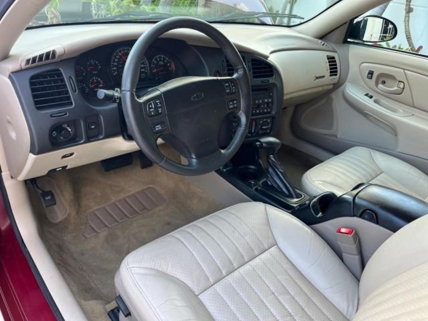 2005 Victory Red /Neutral Chevrolet Monte Carlo 1 FL LT LOW MILES 46,830 (2G1WX12K459) with an 3.8L 3800 V6 SFI Engine engine, Automatic transmission, located at 4701 North Dixie Hwy, Pompano Beach, FL, 33064, (954) 422-2889, 26.240938, -80.123474 - OUR WEBPAGE FLORIDACARS1.COM HAS OVER 100 PHOTOS AND FREE CARFAX LINK 2005 CHEVROLET MONTE CARLO LT ROAD READY 3.8L V6 VIN: 2G1WX12K459271076 NO ACCIDENTS 30 MPG COUPE NO RECALLS 3.8L V6 F OHV THE BEST 1 OWNER FLORIDA GASOLINE LOW MILES 46,830 FRONT WHEEL DRIVE POWER LEATHER SEATS Alloy Wheels Autom - Photo#35