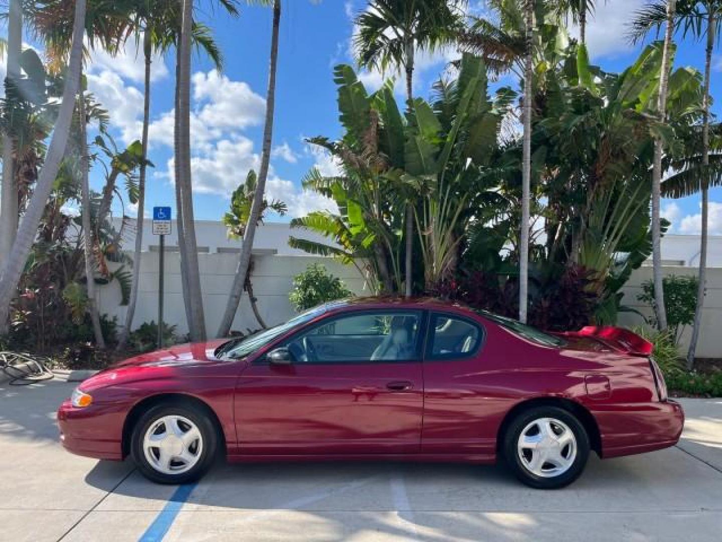 2005 Victory Red /Neutral Chevrolet Monte Carlo 1 FL LT LOW MILES 46,830 (2G1WX12K459) with an 3.8L 3800 V6 SFI Engine engine, Automatic transmission, located at 4701 North Dixie Hwy, Pompano Beach, FL, 33064, (954) 422-2889, 26.240938, -80.123474 - OUR WEBPAGE FLORIDACARS1.COM HAS OVER 100 PHOTOS AND FREE CARFAX LINK 2005 CHEVROLET MONTE CARLO LT ROAD READY 3.8L V6 VIN: 2G1WX12K459271076 NO ACCIDENTS 30 MPG COUPE NO RECALLS 3.8L V6 F OHV THE BEST 1 OWNER FLORIDA GASOLINE LOW MILES 46,830 FRONT WHEEL DRIVE POWER LEATHER SEATS Alloy Wheels Autom - Photo#4