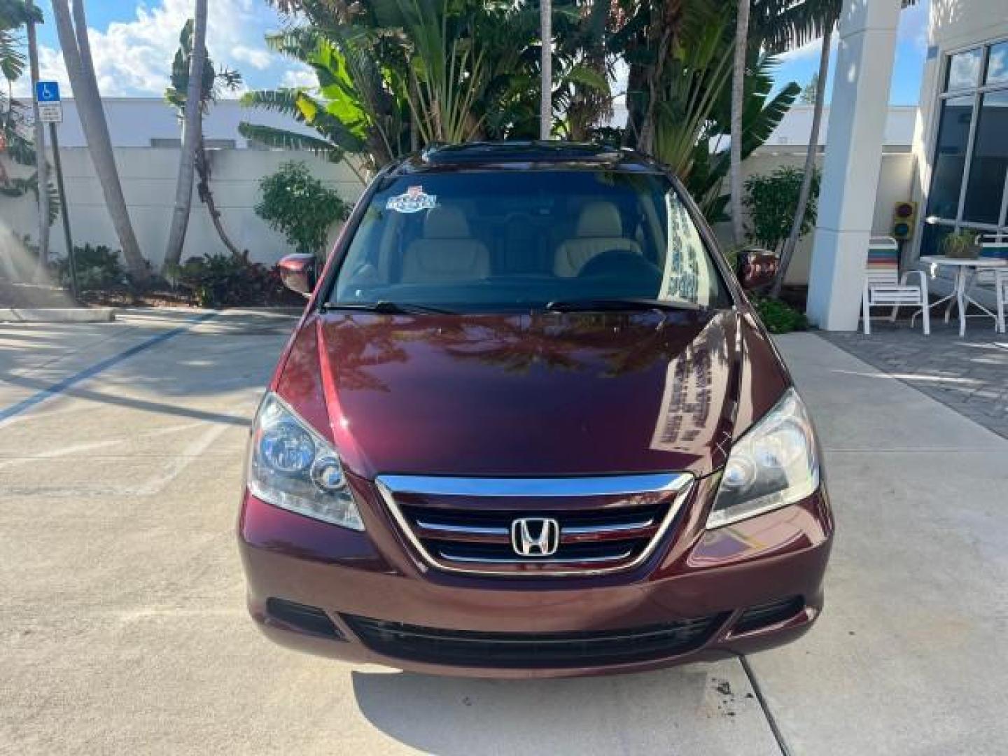 2007 Dark Cherry Pearl /Ivory Honda Odyssey SUNROOF NAV 1 FL EX-L LOW MILES 67,947 (5FNRL38627B) with an 3.5L SOHC MPFI 24-Valve i-VTEC V6 Engine engine, Automatic transmission, located at 4701 North Dixie Hwy, Pompano Beach, FL, 33064, (954) 422-2889, 26.240938, -80.123474 - OUR WEBPAGE FLORIDACARS1.COM HAS OVER 100 PHOTOS AND FREE CARFAX LINK 2007 HONDA ODYSSEY EX-L 26 MPG ROAD READY 3.5L V6 VIN: 5FNRL38627B442296 POWER SEATS NO ACCIDENTS NO RECALLS VAN LOW MILES 67,947 1 OWNER FLORIDA 3.5L V6 F SOHC 24V NAVIGATION POWER SLIDING DOORS GASOLINE BACK UP CAMERA POWER SUNR - Photo#2