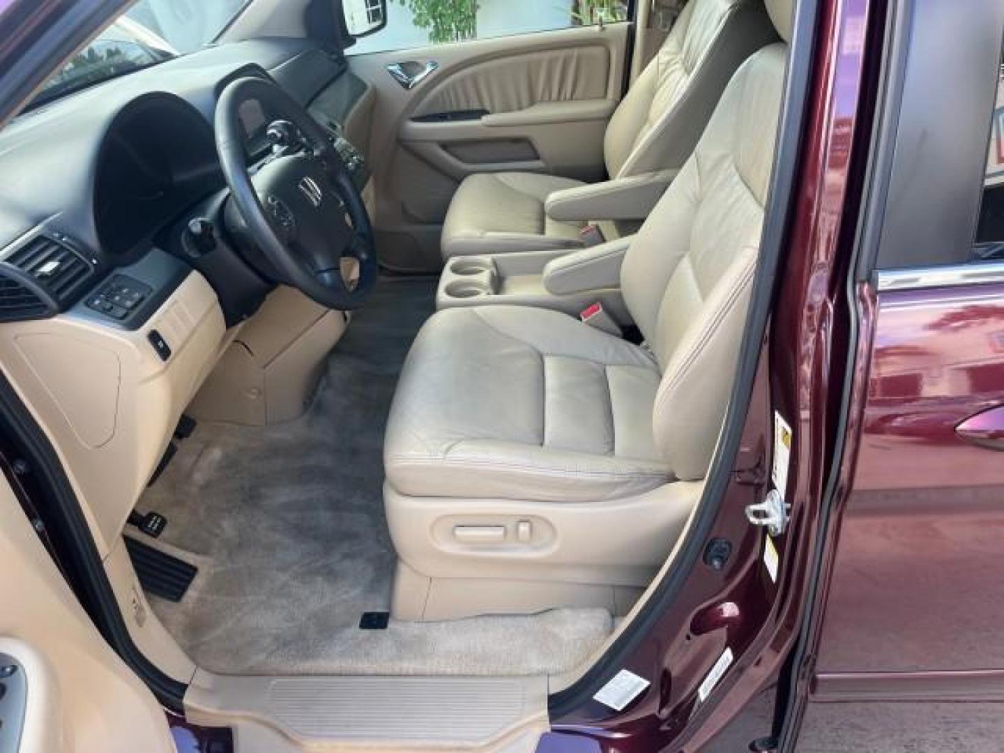 2007 Dark Cherry Pearl /Ivory Honda Odyssey SUNROOF NAV 1 FL EX-L LOW MILES 67,947 (5FNRL38627B) with an 3.5L SOHC MPFI 24-Valve i-VTEC V6 Engine engine, Automatic transmission, located at 4701 North Dixie Hwy, Pompano Beach, FL, 33064, (954) 422-2889, 26.240938, -80.123474 - OUR WEBPAGE FLORIDACARS1.COM HAS OVER 100 PHOTOS AND FREE CARFAX LINK 2007 HONDA ODYSSEY EX-L 26 MPG ROAD READY 3.5L V6 VIN: 5FNRL38627B442296 POWER SEATS NO ACCIDENTS NO RECALLS VAN LOW MILES 67,947 1 OWNER FLORIDA 3.5L V6 F SOHC 24V NAVIGATION POWER SLIDING DOORS GASOLINE BACK UP CAMERA POWER SUNR - Photo#46