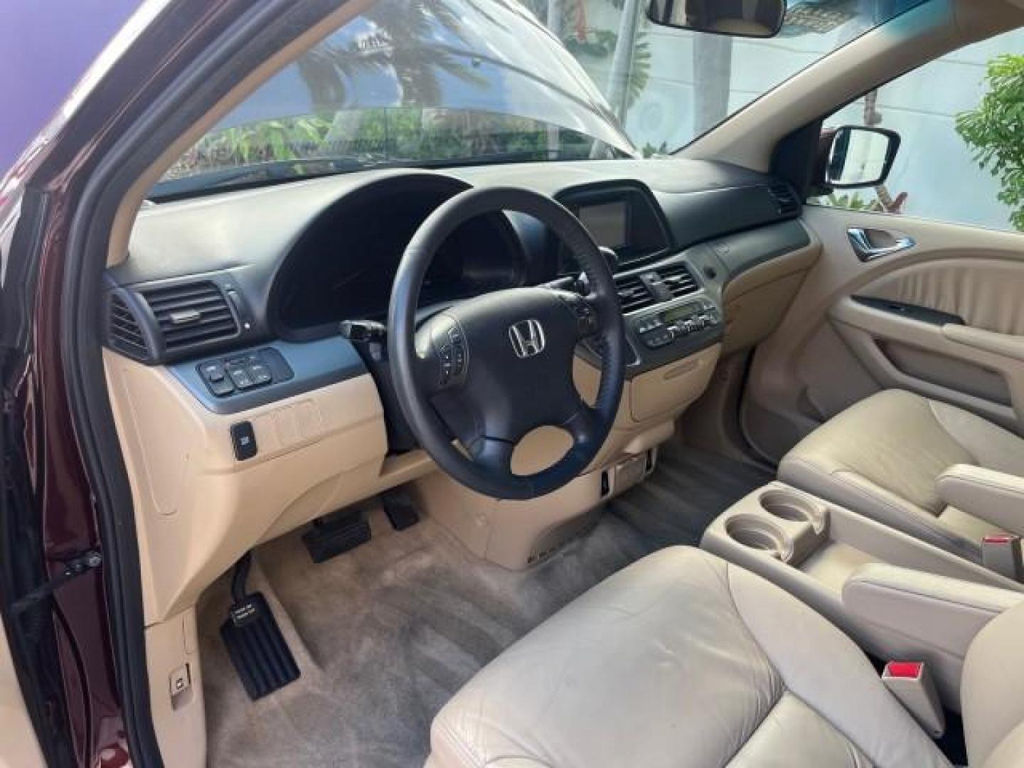 2007 Dark Cherry Pearl /Ivory Honda Odyssey SUNROOF NAV 1 FL EX-L LOW MILES 67,947 (5FNRL38627B) with an 3.5L SOHC MPFI 24-Valve i-VTEC V6 Engine engine, Automatic transmission, located at 4701 North Dixie Hwy, Pompano Beach, FL, 33064, (954) 422-2889, 26.240938, -80.123474 - OUR WEBPAGE FLORIDACARS1.COM HAS OVER 100 PHOTOS AND FREE CARFAX LINK 2007 HONDA ODYSSEY EX-L 26 MPG ROAD READY 3.5L V6 VIN: 5FNRL38627B442296 POWER SEATS NO ACCIDENTS NO RECALLS VAN LOW MILES 67,947 1 OWNER FLORIDA 3.5L V6 F SOHC 24V NAVIGATION POWER SLIDING DOORS GASOLINE BACK UP CAMERA POWER SUNR - Photo#49